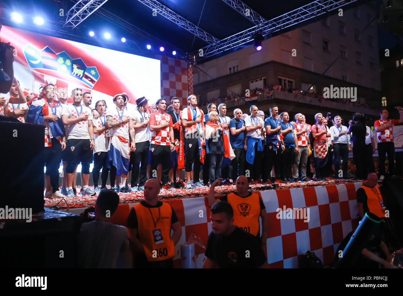 ZAGREB, CROATIA - JULY 16, 2018 : Croatia National Football Team while anthem playing on the stage during welcome home celebration on Ban Jelacic Squa Stock Photo