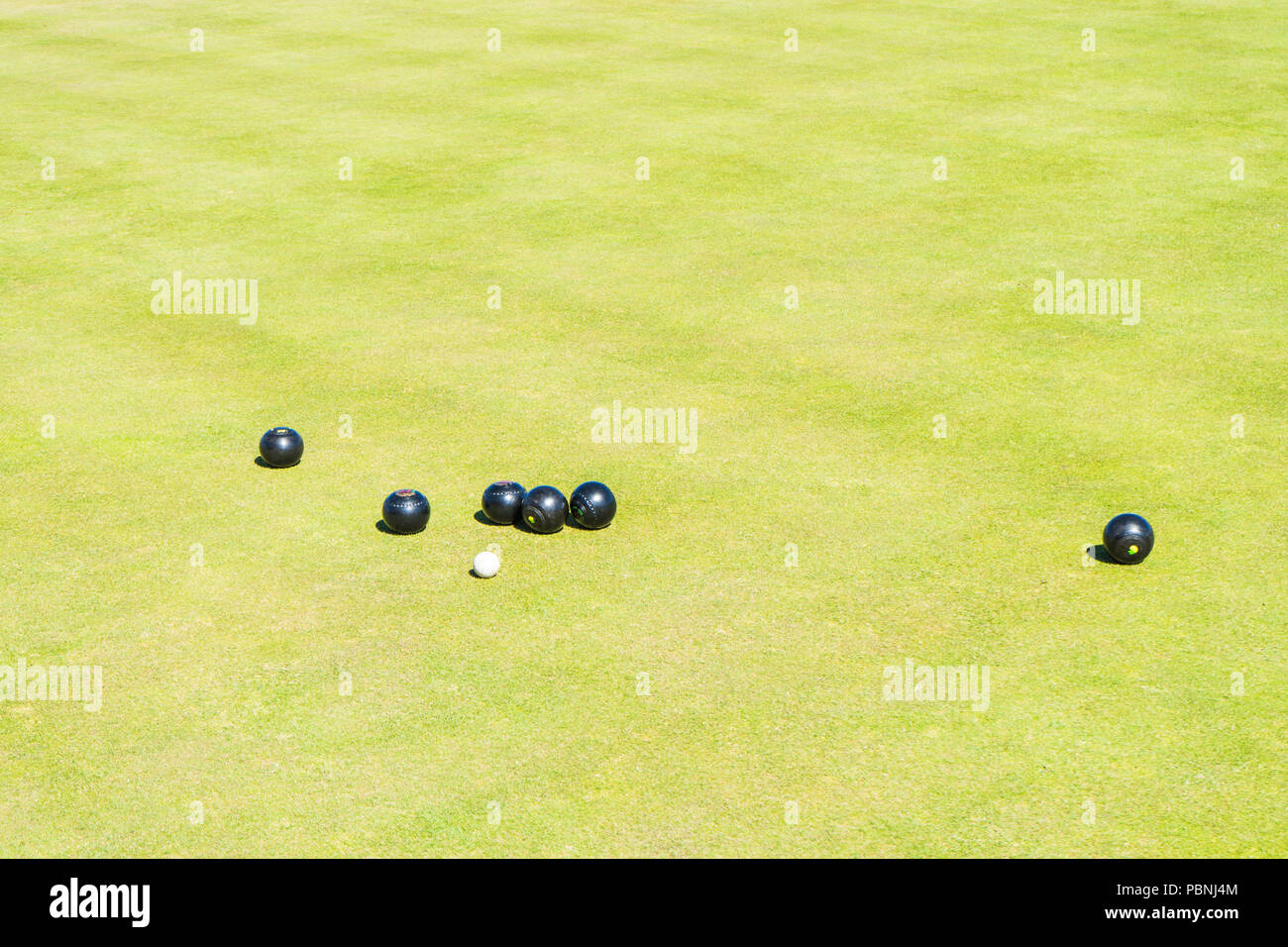 Men playing bowls at the bowling club  Greate Yarmouth, England. Bowls Tournaments in Greater Yarmouth.The bowling green. Stock Photo