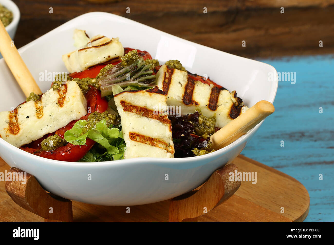 Grilled Halloumi cheese with fresh green salad Stock Photo Alamy
