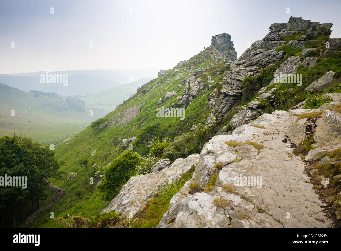 Walkers at the Valley of Rocks, Lynton, North Devon, looking inland, on the South West Coast Path. Stock Photo