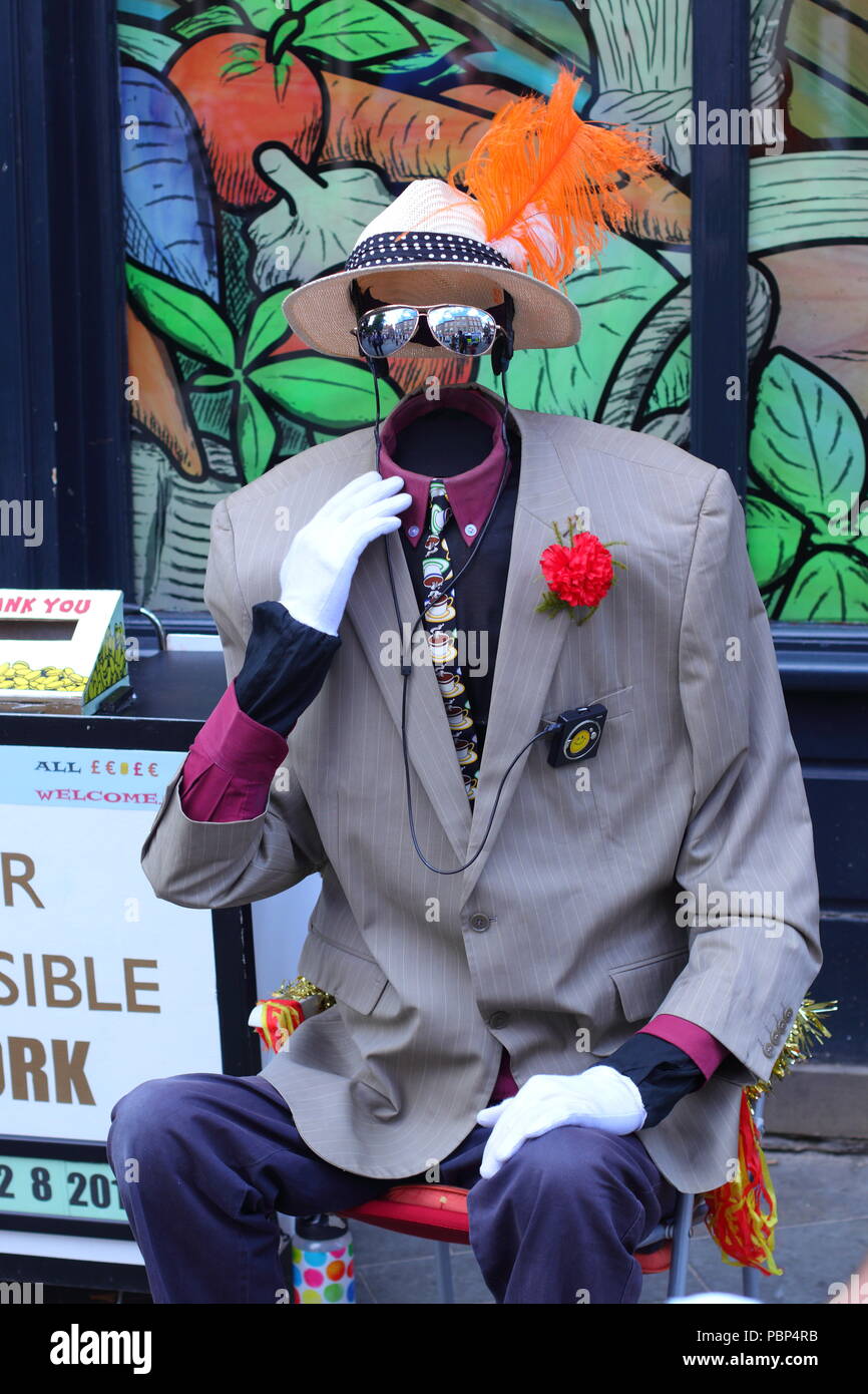 A busker cleverly disguises his self as the Invisible Man in the City of York,North Yorkshire. Stock Photo