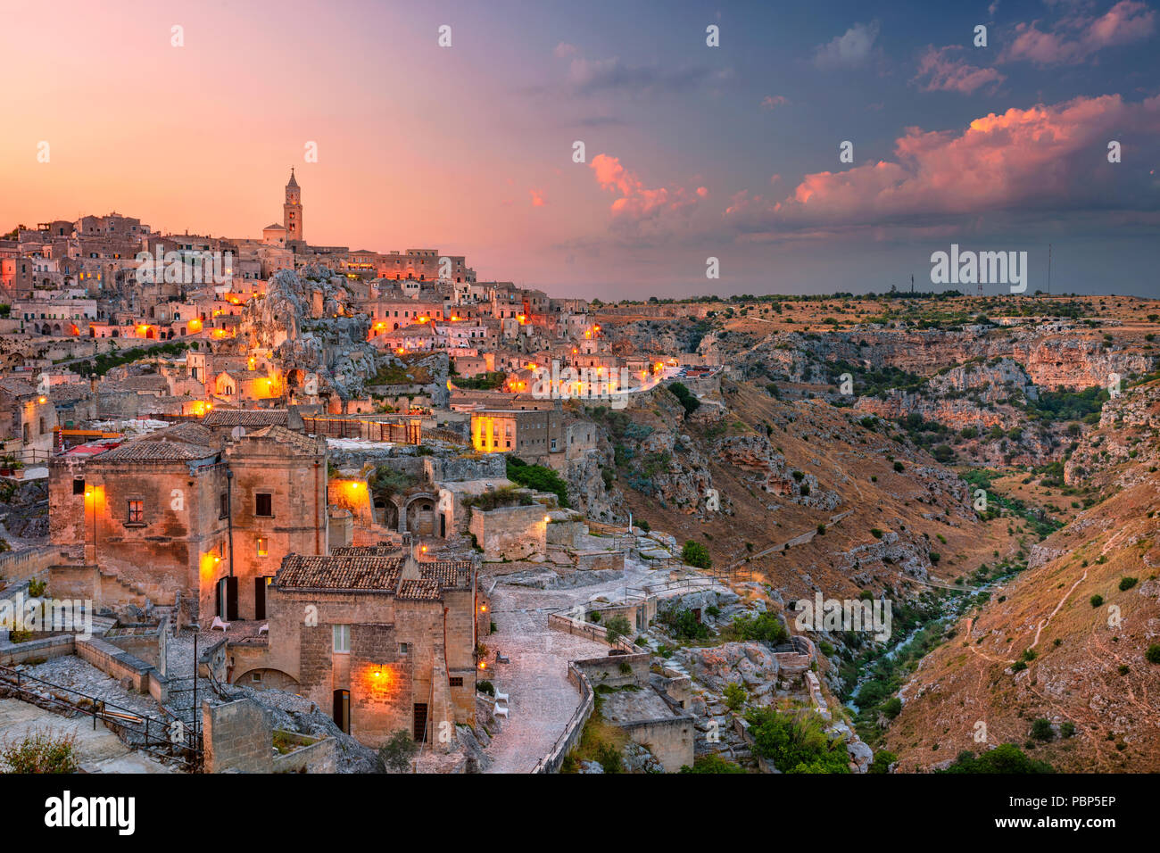 Matera, Italy. Cityscape aerial image of medieval city of Matera, Italy during beautiful sunset. Stock Photo