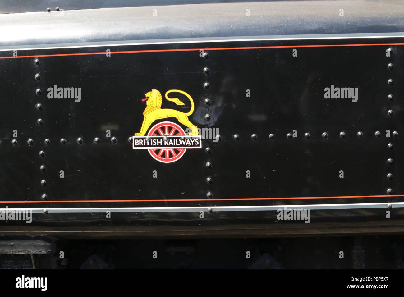 British Railways logo on tender of BR Standard 4MT No. 76079 on the North Yorkshire Moors Railway at Pickering Station Stock Photo