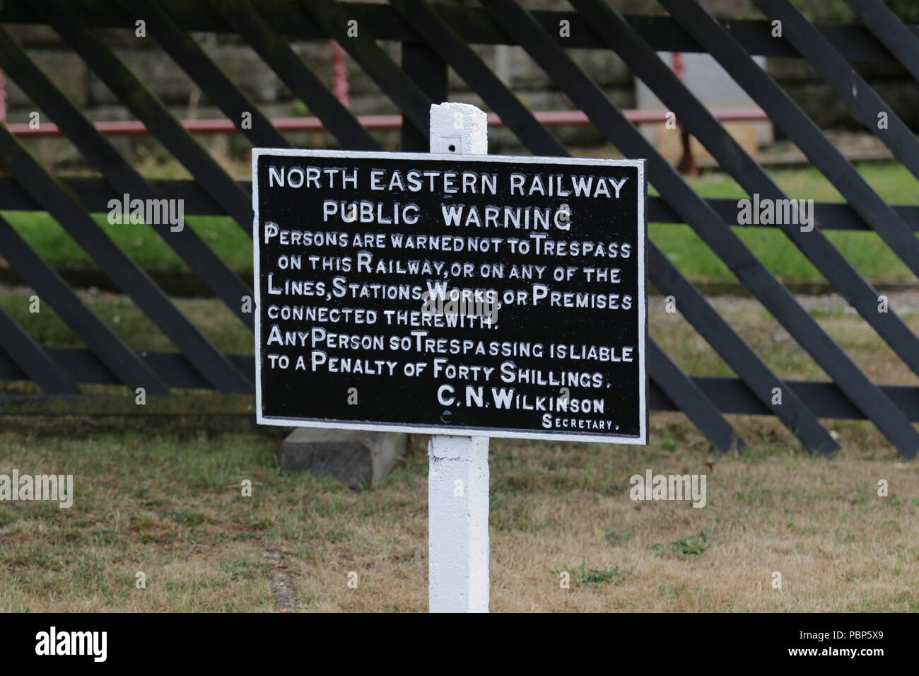North Eastern Railway cast iron warning sign beside the North Yorkshire Moors Railway Stock Photo