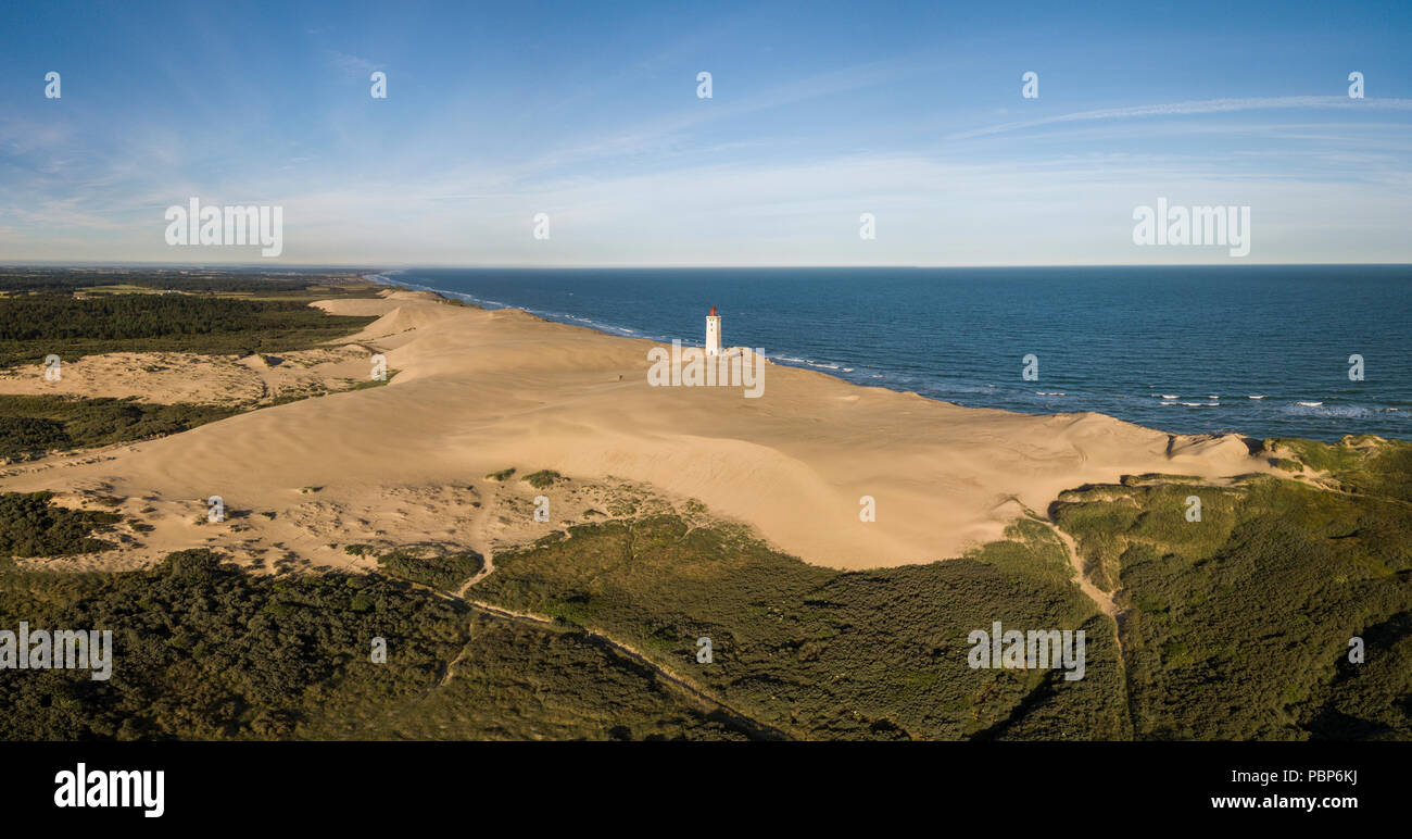 Aerial view of Rubjerg Knude lighthouse buried in sands on the coast of the North Sea Stock Photo