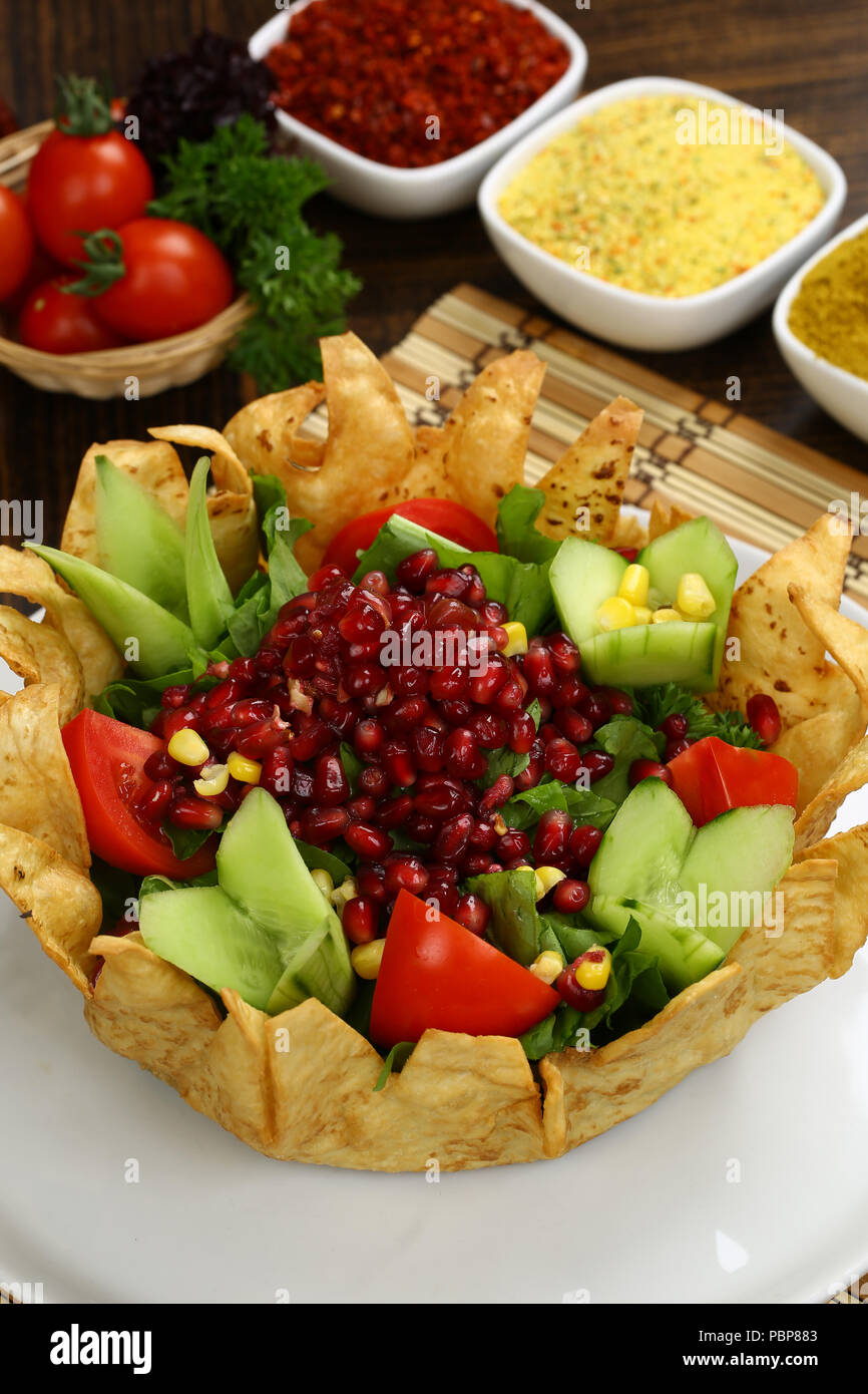 Taco salad in a baked tortilla Stock Photo Alamy