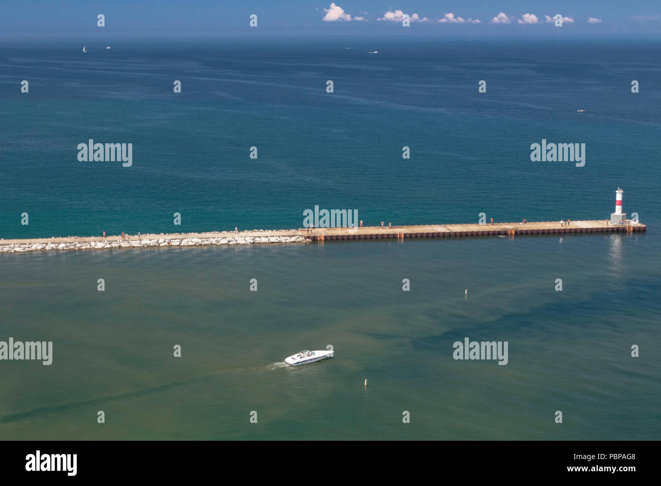 Aerial view of a boat leaving Petoskey marina on a sunny summer day Stock Photo