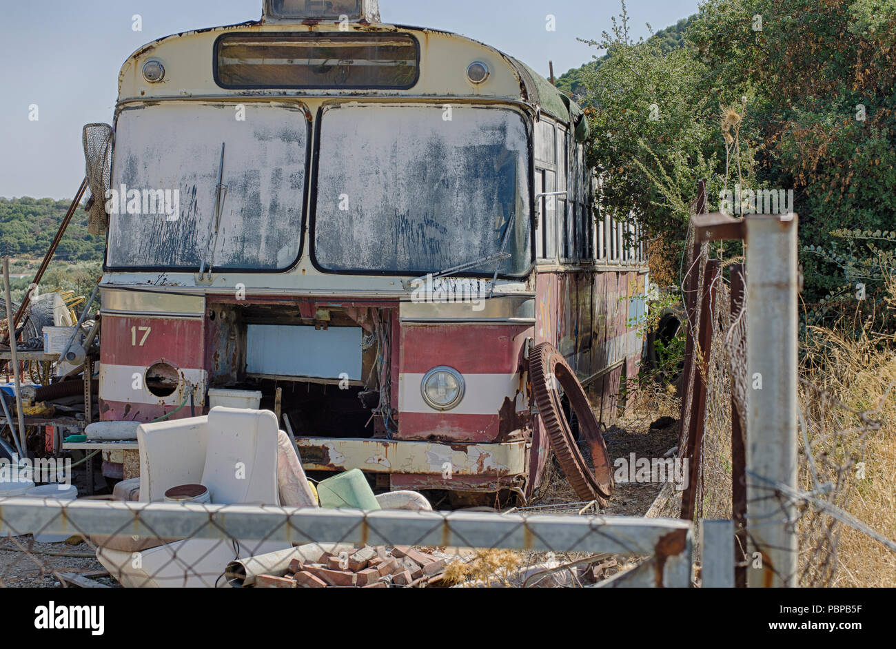 Old vintage rusty regular bus on the island Rhodes (Greece) Stock Photo