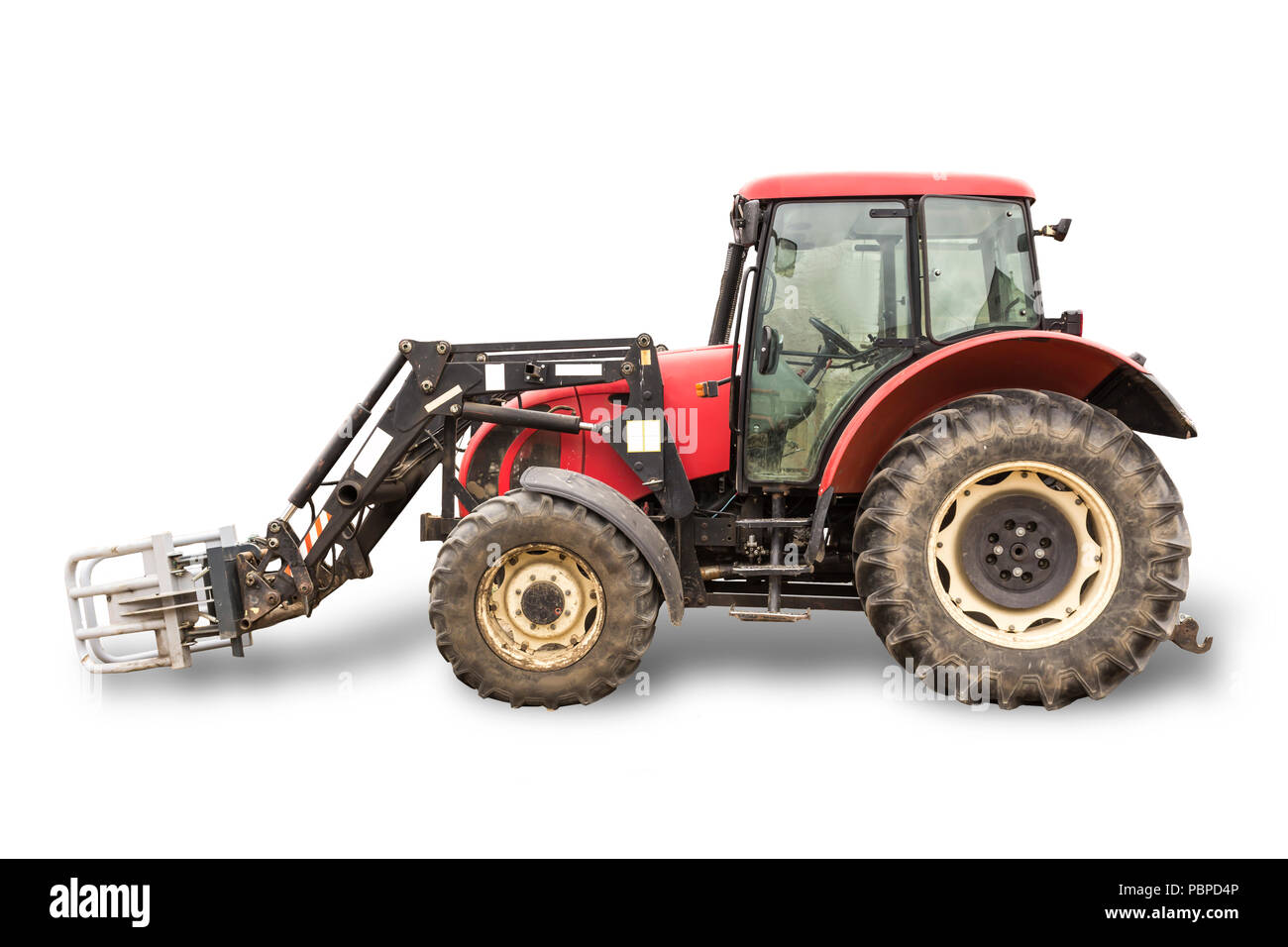 Tractor with hydraulic lift for carrying bales of hay and silage.Isolated  foto of the side of the agricultural machine.The equipment for a dairy farm  Stock Photo - Alamy