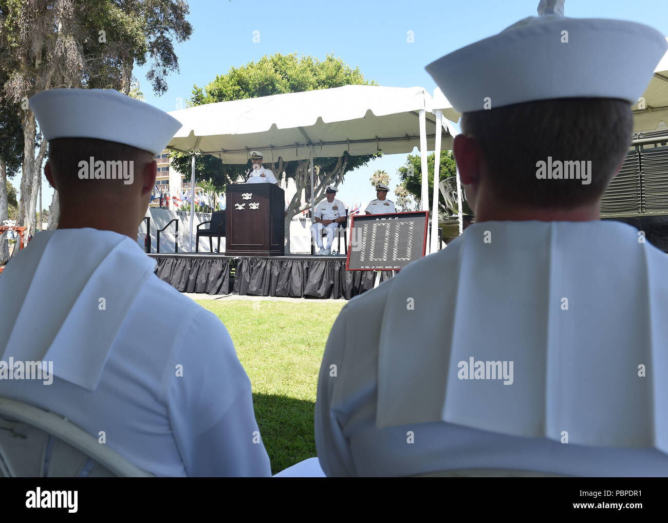 180719-N-OI558-0457 SAN DIEGO (July 19, 2018) - Cmdr. Matthew Russell, commanding officer of Special Boat Team (SBT) 20 delivers a speech to recent graduates of Special Warfare Combatant-Craft Crewman (SWCC) Class 100. Following a 37-week training course, these students will now join various Naval Special Warfare commands to begin their careers as special operations craft operators. (U.S. Navy photo by Mass Communication Specialist 3rd Class Chanel Turner/Released) Stock Photo