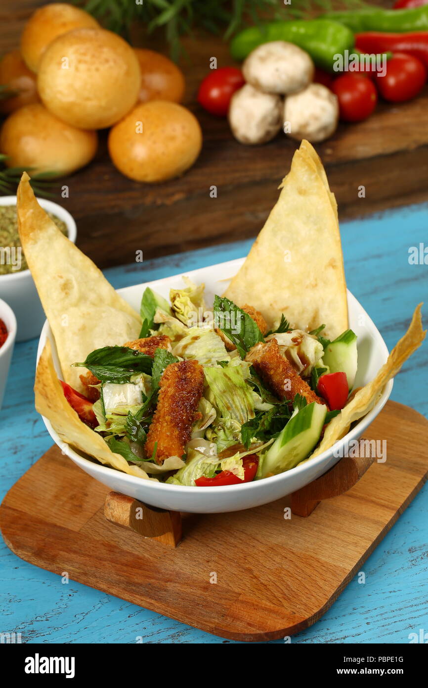 Taco salad in a baked tortilla Stock Photo Alamy