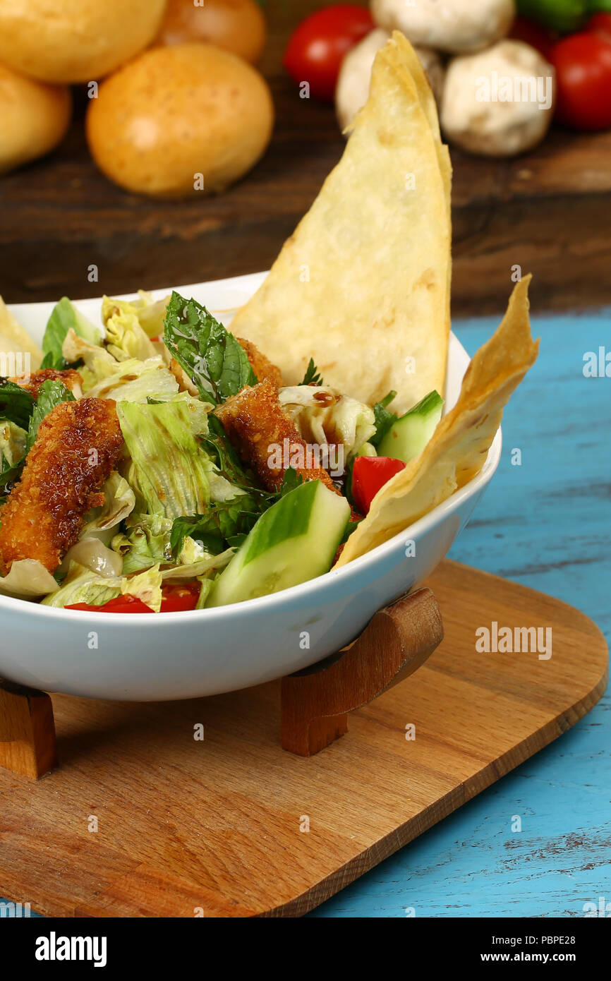 Taco salad in a baked tortilla Stock Photo Alamy
