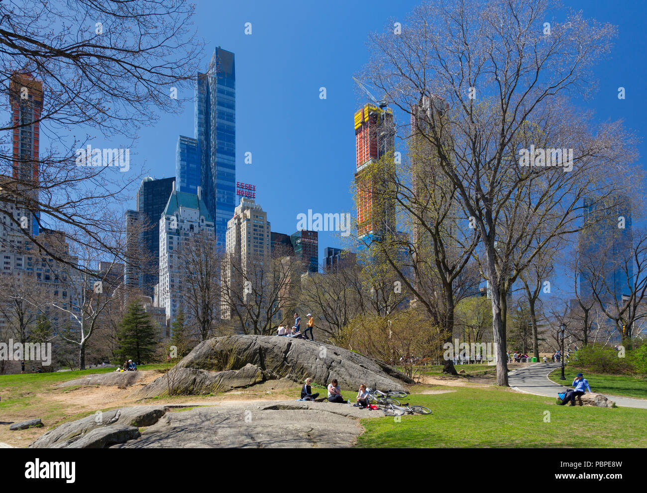 Chilling in the Spring weekend sunshine in Central Park, New York Stock Photo