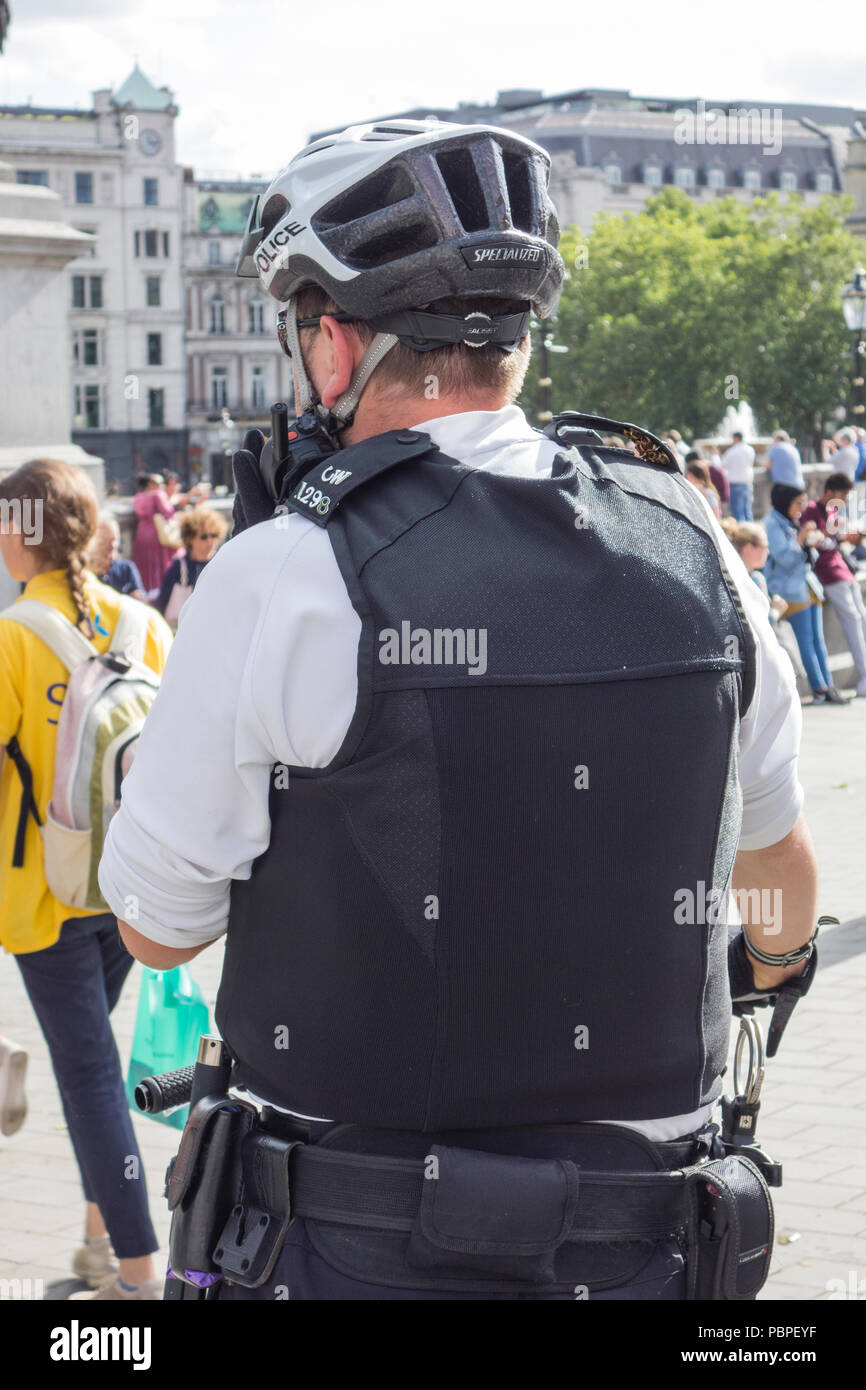 Policeman wearing helmet hi-res stock photography and images - Alamy