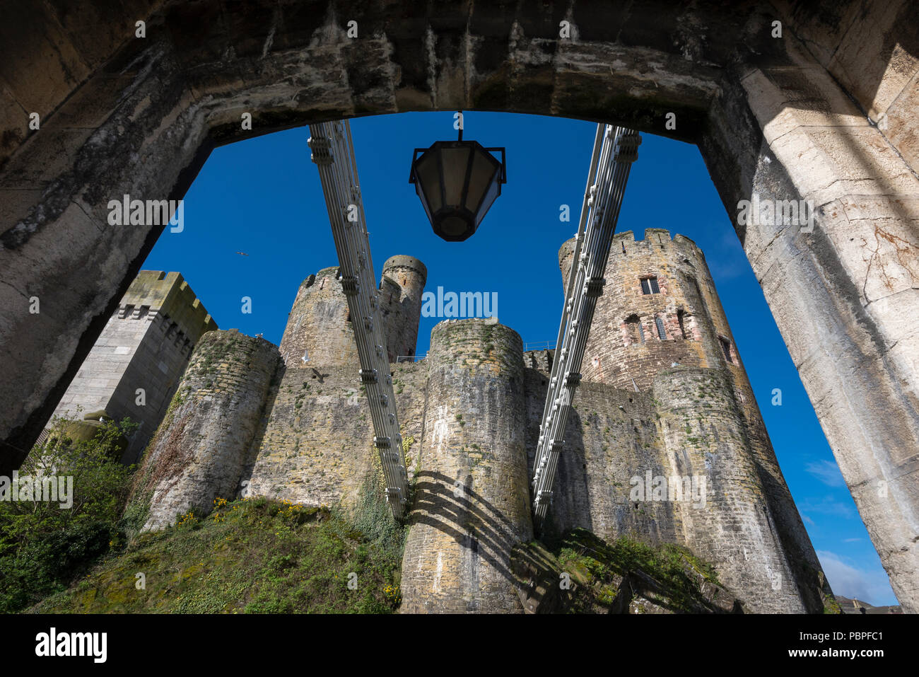 View of Conwy castle from the end of the famous suspension bridge, Conwy, North Wales, UK. Stock Photo