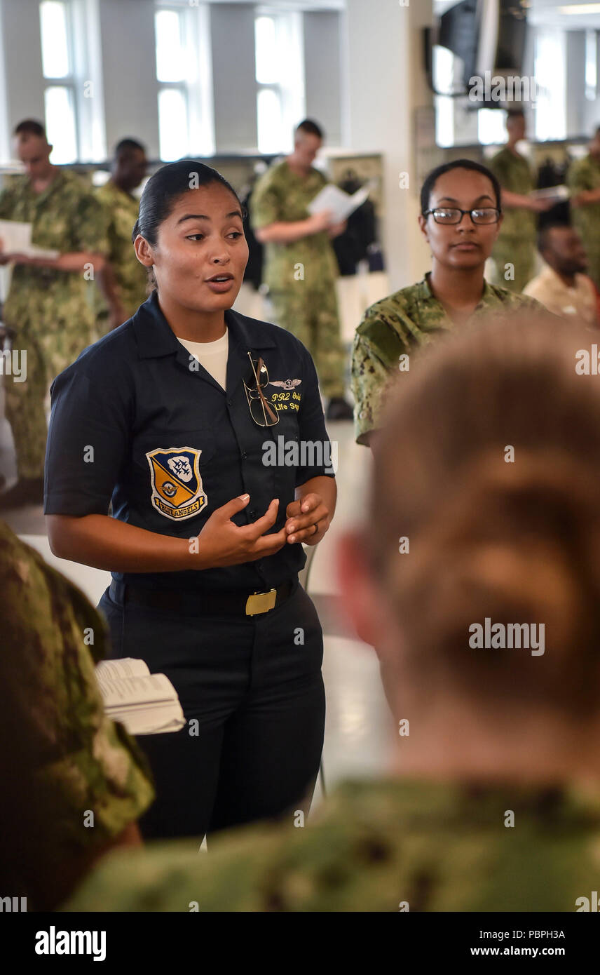 180724-N-UK306-1204 GREAT LAKES, Illinois (July 24, 2018) Aircrew Survival Equipmentman 2nd Class Nicole Oviedo, assigned to the U.S. Navy Flight Demonstration Squadron, the Blue Angels, mentors the recruits of the squadron’s sponsored boot camp division at Recruit Training Command (RTC). About 38,000 to 40,000 recruits graduate annually from the Navy's only boot camp. . (U.S. Navy photo by Mass Communication Specialist 2nd Class Timothy Schumaker/Released) Stock Photo