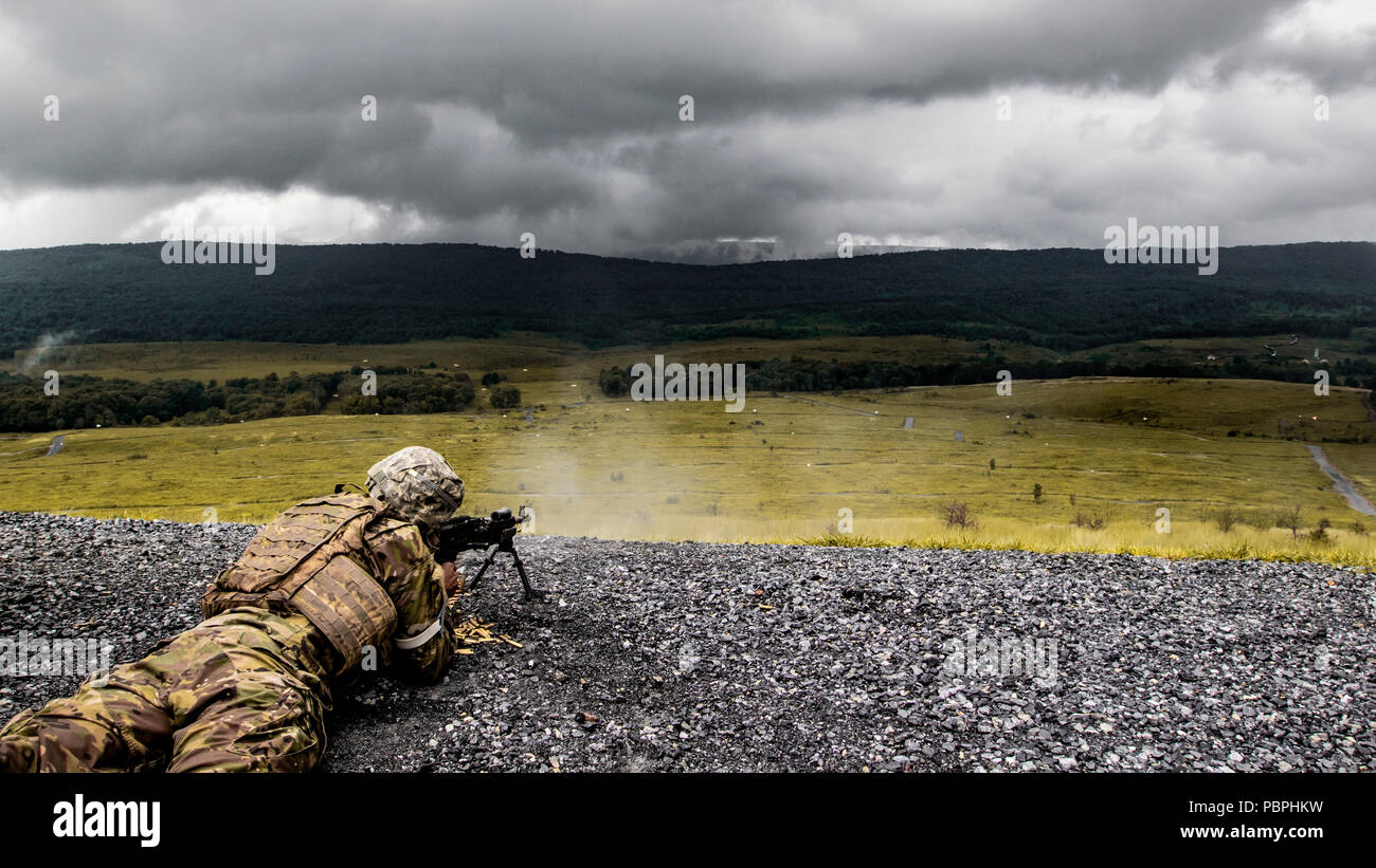 Sgt. Quentin Davis with the New York National Guard fires a M240 Bravo