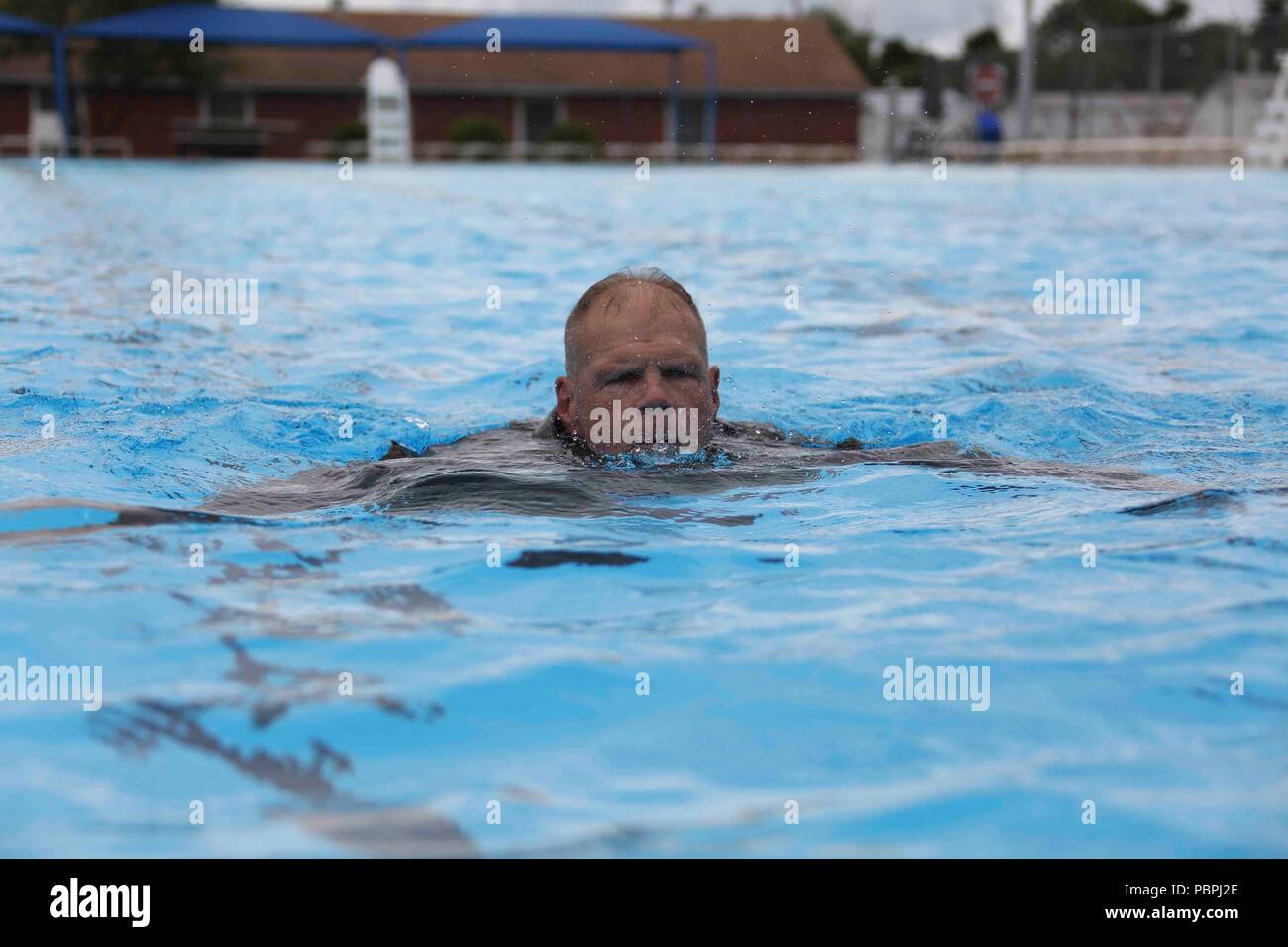 Commandant of the Marine Corps Gen. Robert B. Neller conducts a swim