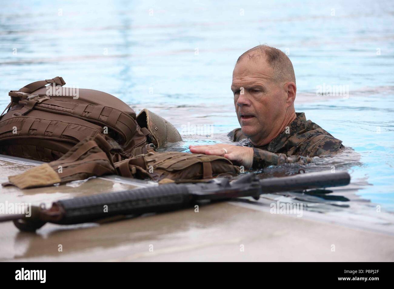 Commandant of the Marine Corps Gen. Robert B. Neller conducts a swim