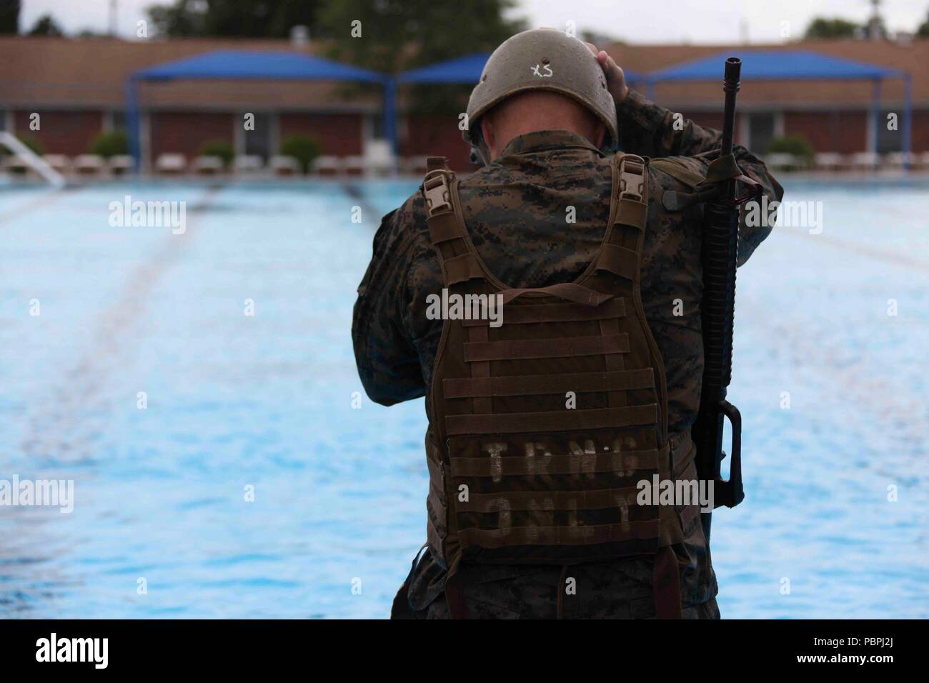 Commandant of the Marine Corps Gen. Robert B. Neller conducts a swim
