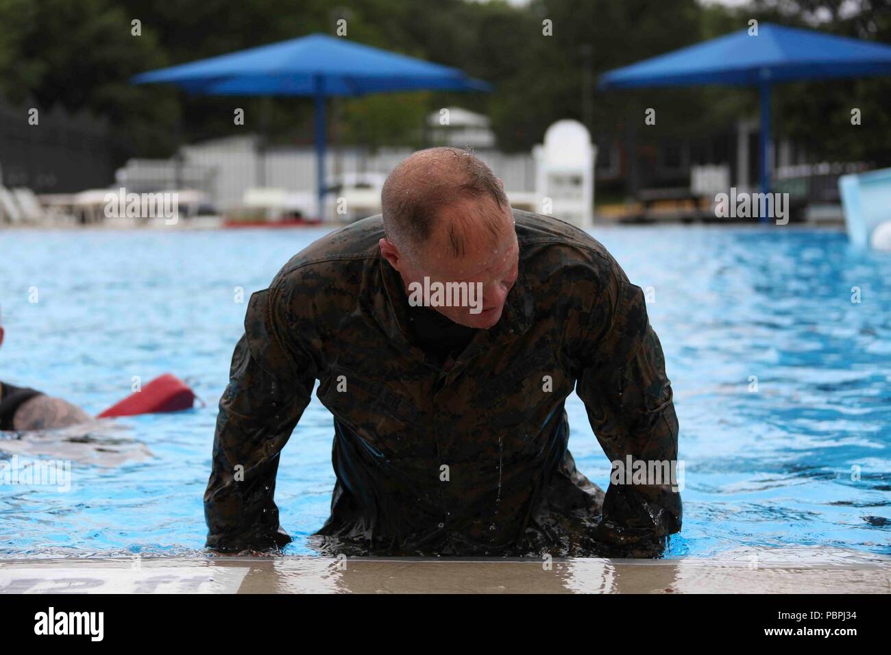Commandant of the Marine Corps Gen. Robert B. Neller conducts a swim