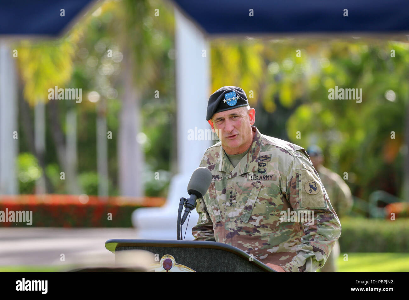U.S. Army Gen. Robert B. Brown, the commander of the U.S. Army Pacific, addresses attendees to Brig. Gen. Sean Gainey and Brig. Gen. Michael Morrissey’s, the outgoing and incoming 94th Army Air and Missile Defense, at the change of command ceremony, July 26, 2018, historic Palm Circle lawn at Fort Shafter, Hawaii. Stock Photo
