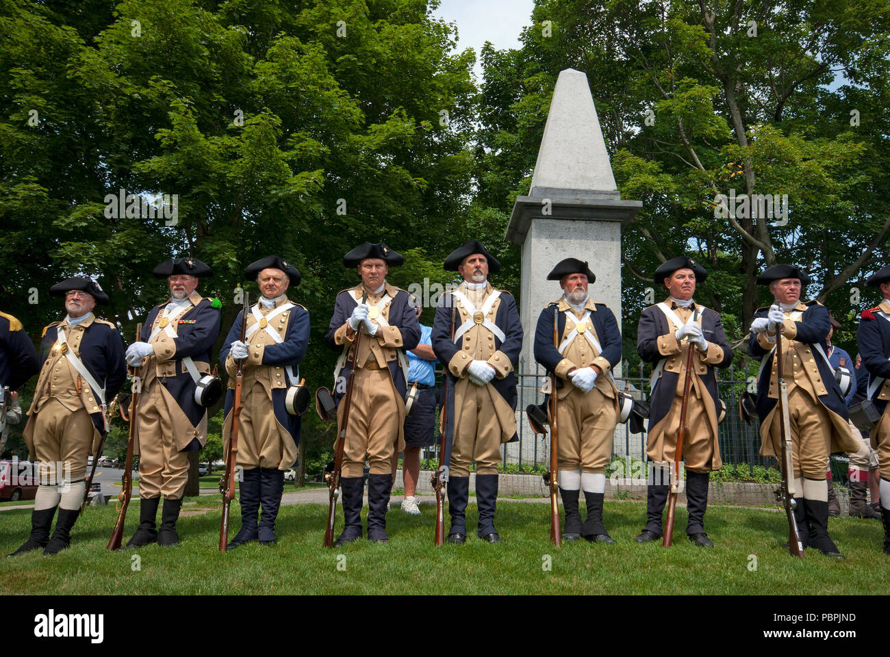 Men in military uniform to reenact the American War of Independence, Lexington Battle Green, Lexington, Middlesex County, Massachusetts, USA Stock Photo