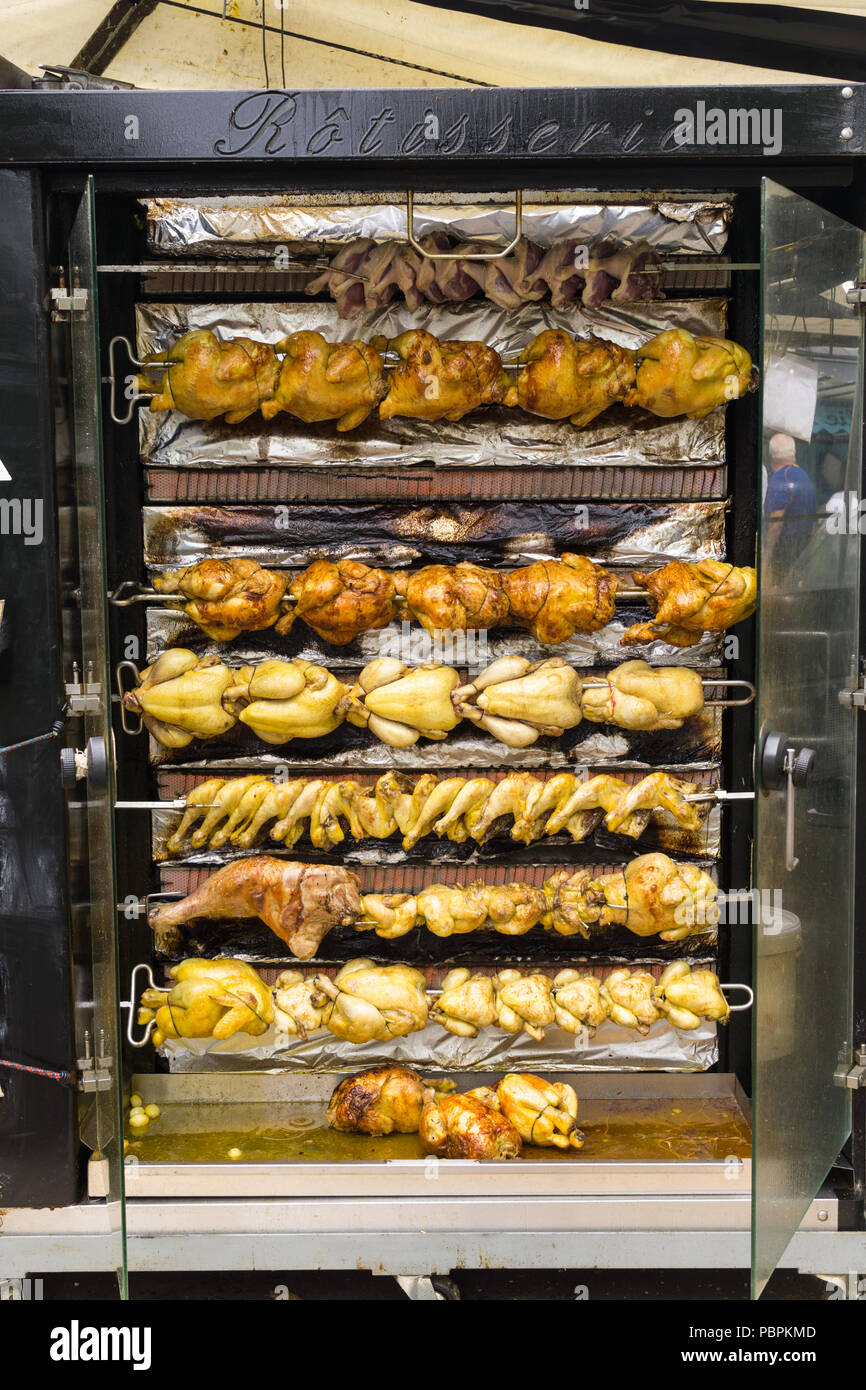 Rotisserie - Chicken cooking on horizontal spit-roasting (horizontal  rotisserie) at fresh market in Paris, France, Europe Stock Photo - Alamy