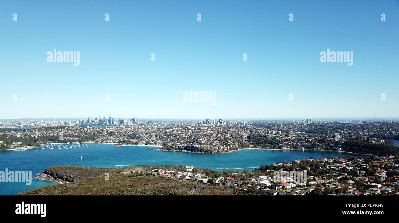 Aerial view of Sydney CBD, North Sydney and Chatswood with  financial district skyscrapers surrounded by Sydney Harbour, Middle Harbour and parks. Stock Photo