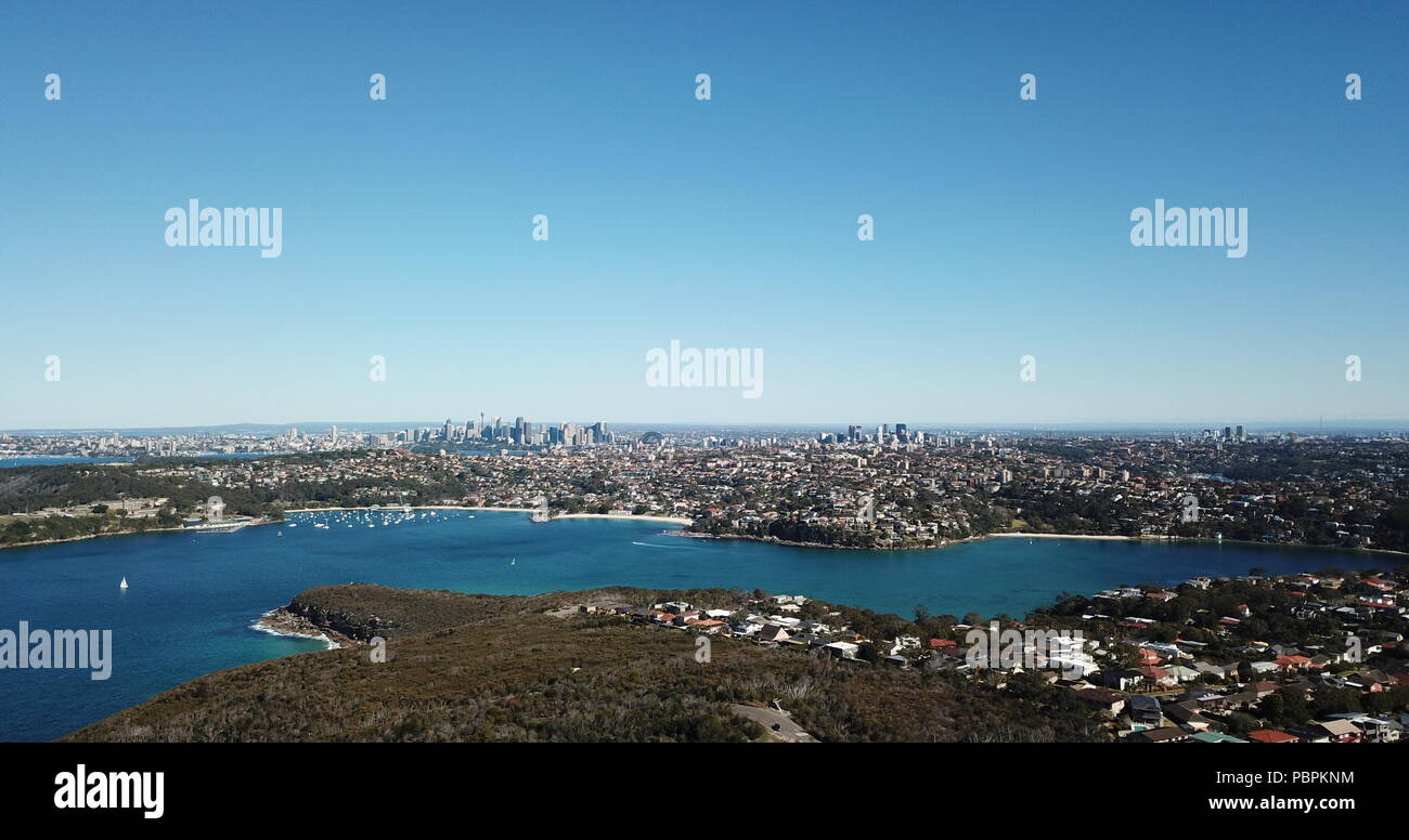 Aerial view of Sydney CBD, North Sydney and Chatswood with  financial district skyscrapers surrounded by Sydney Harbour, Middle Harbour and parks. Stock Photo