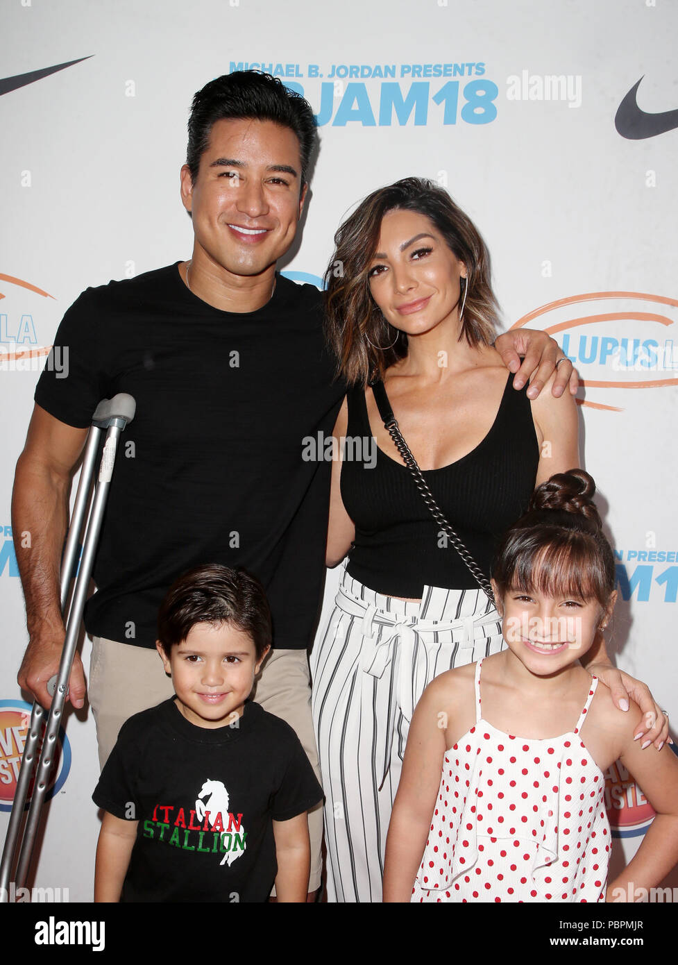 Hollywood, California, 28th July, 2018. Mario Lopez, Dominic Lopez, Gia