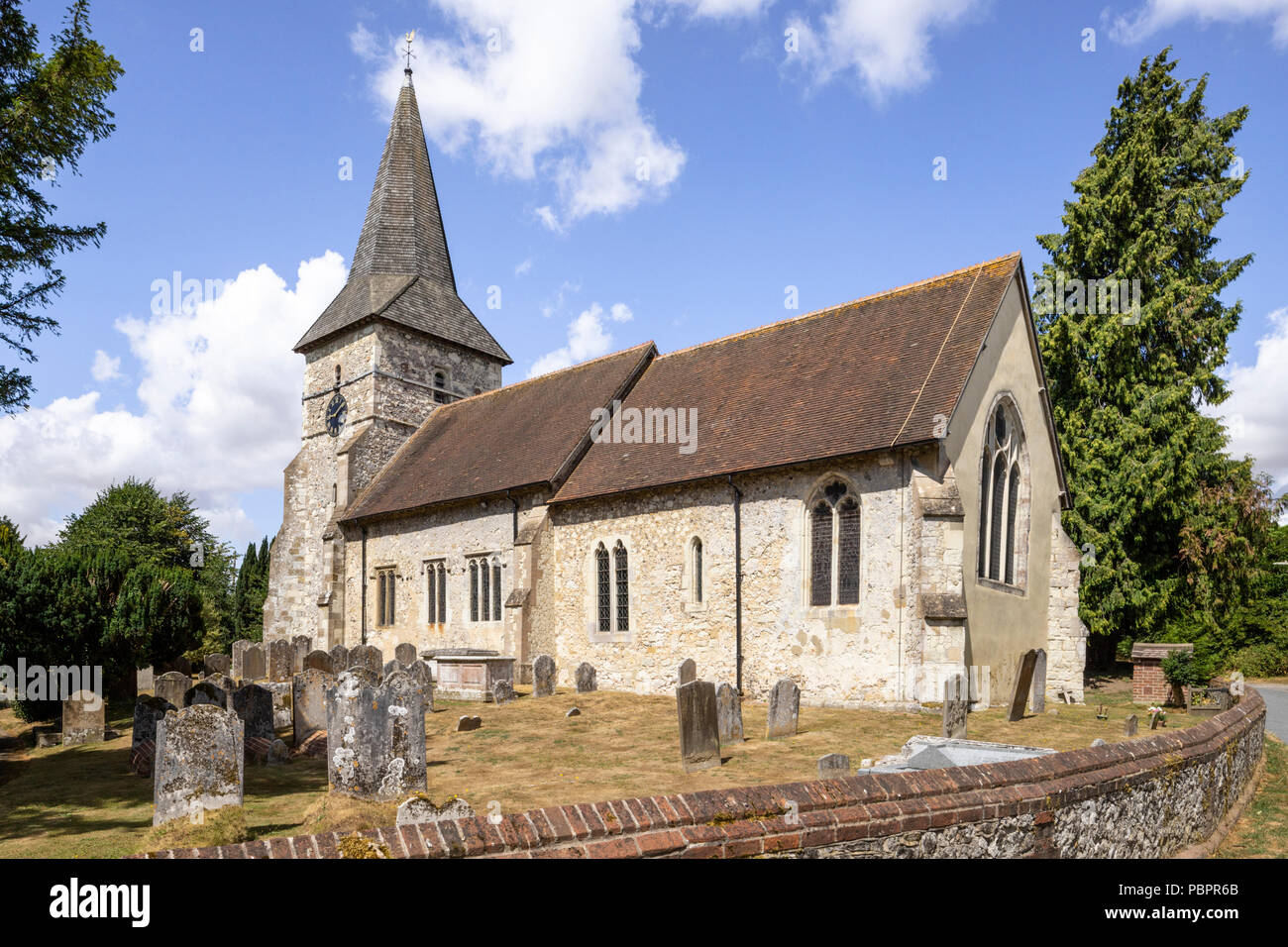 Holybourne, Hampshire, 28 July 2018. The church of the Holy Rood in Holybourne, near Alton, Hampshire where on Saturday 28th July 2018 a solid oak pew was dedicated to the memory of the haemophiliacs who died as the result of being treated with contaminated blood products while at the nearby Treloar College. It is thought that 72 pupils have died out of 89 infected. Stock Photo
