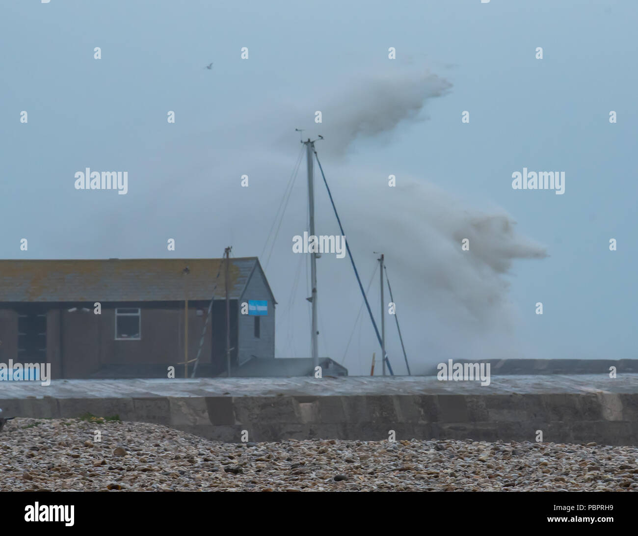 Lyme Regis, Dorset, UK. 29th July 2018. UK Weather Storm waves crash