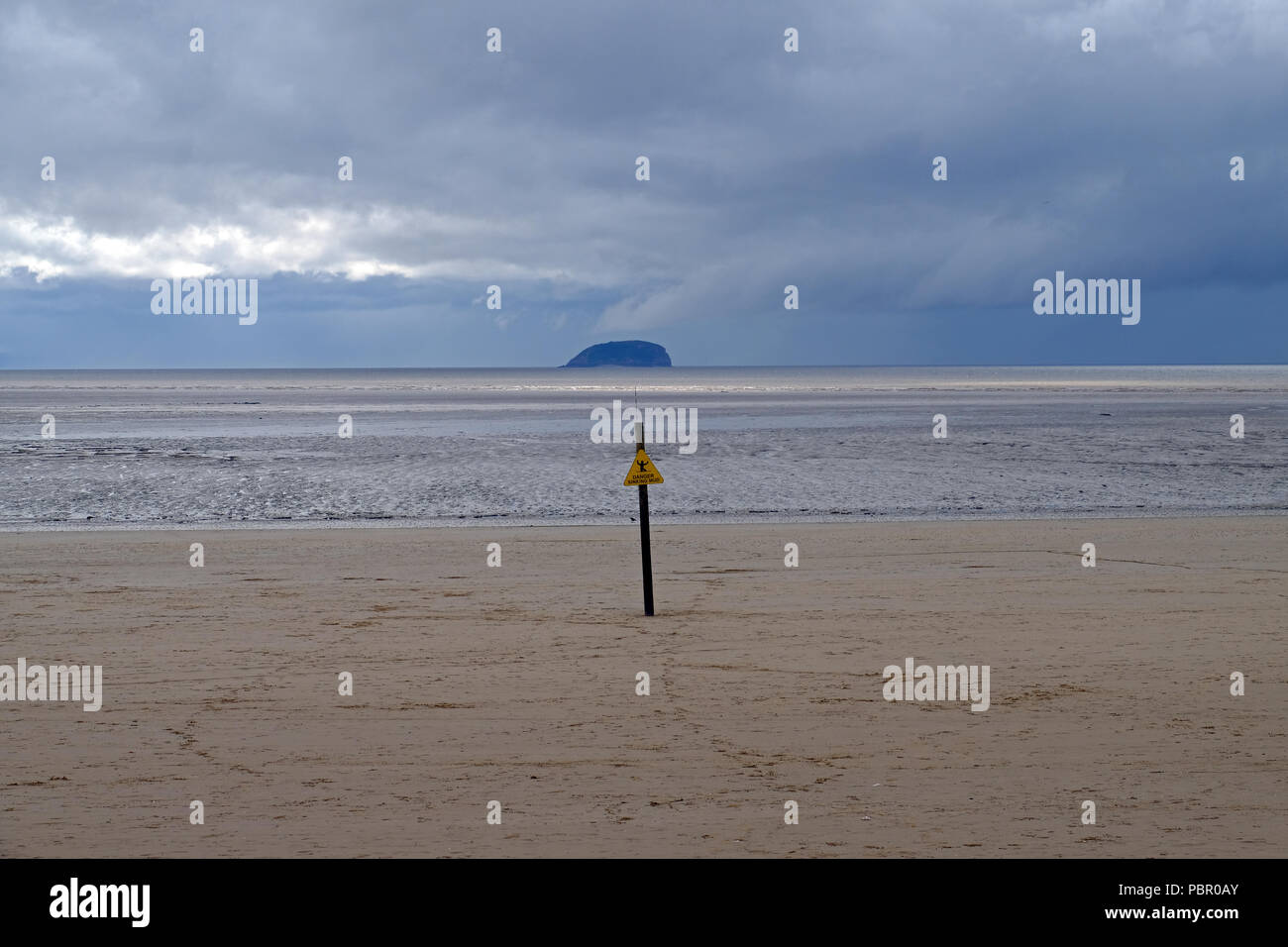 Weston-super-Mare, UK. 29th July, 2018. UK weather: the hot weather of recent weeks is replaced by showers, cloud, and a stiff breeze which keep most people away from the beach. Keith Ramsey/Alamy Live News Stock Photo