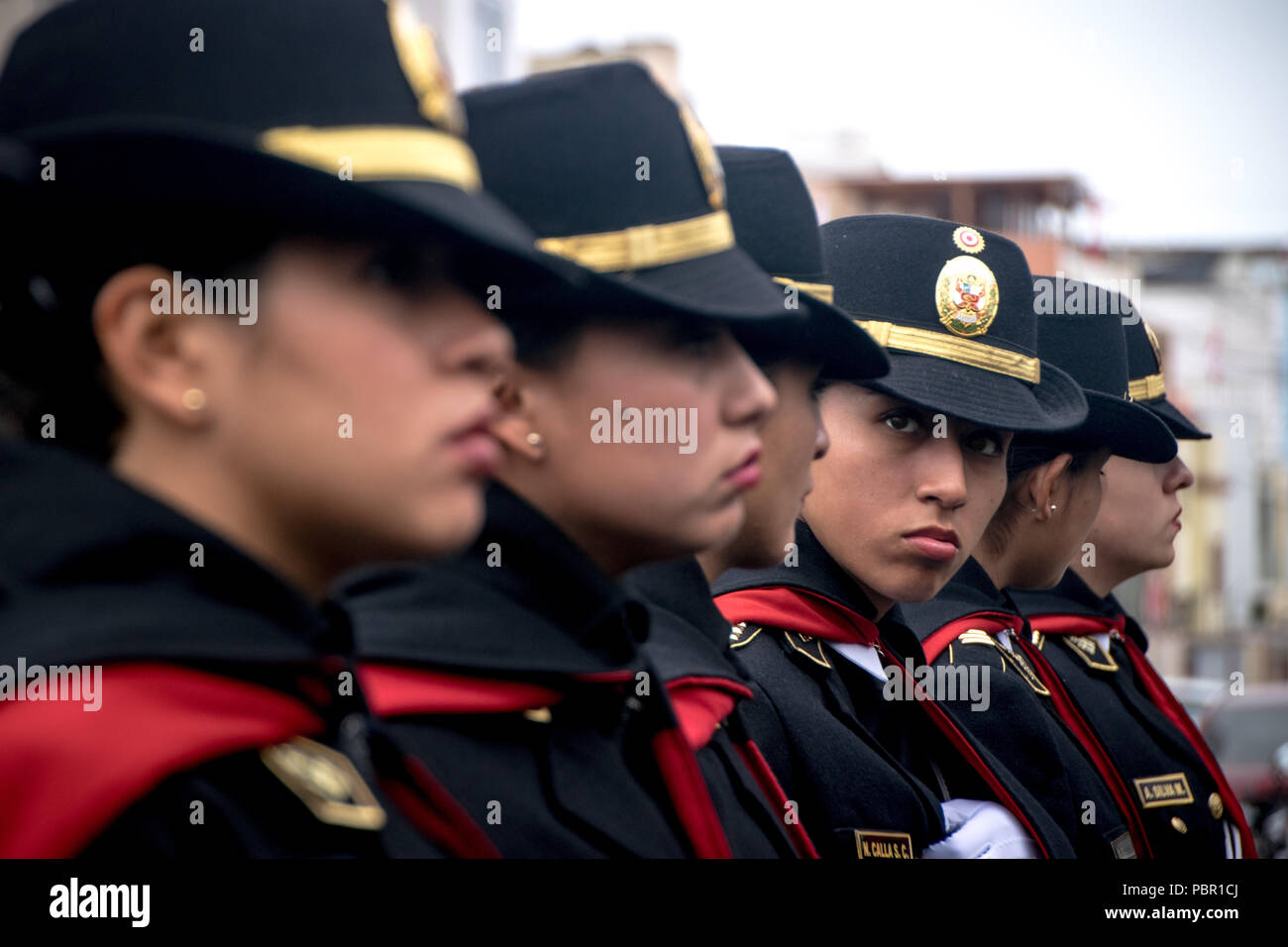 Lima, Lima Region, Peru. 29th July, 2018. Women of Peru's Policia Nacional seen marching.Members of Peru's armed forces, coastguard, search & rescue, and police march in full uniform during the country's Gran Parada Militar. This parade always occurs the day after Peru's Independence Day marking the official end of festivities across the nation. Credit: Jason Sheil/SOPA Images/ZUMA Wire/Alamy Live News Stock Photo
