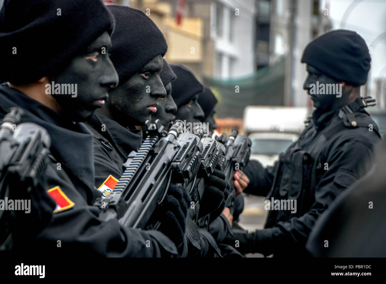 Lima, Lima Region, Peru. 29th July, 2018. Peruvian special forces with fearsome face paint seen marching.Members of Peru's armed forces, coastguard, search & rescue, and police march in full uniform during the country's Gran Parada Militar. This parade always occurs the day after Peru's Independence Day marking the official end of festivities across the nation. Credit: Jason Sheil/SOPA Images/ZUMA Wire/Alamy Live News Stock Photo