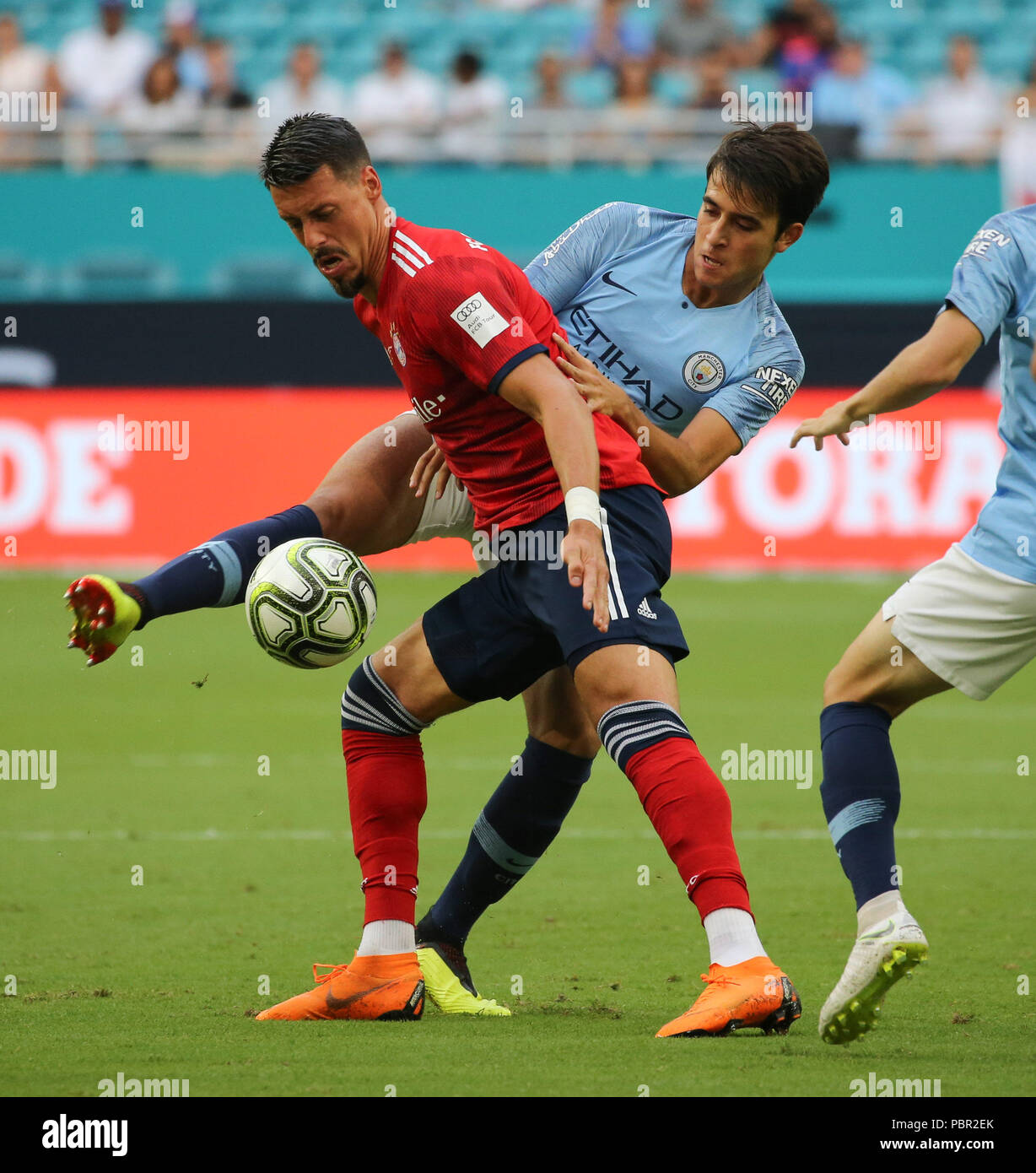 Miami Gardens, Florida, USA. 28th July, 2018. Manchester City defender Eric Garcia (50) (right) battles for the ball with FC Bayern forward Sandro Wagner (2) (left) with during the second half of an International Champions Cup match between FC Bayern and Manchester City at the Hard Rock Stadium in Miami Gardens, Florida. Manchester City won 3-2. Credit: Mario Houben/ZUMA Wire/Alamy Live News Stock Photo