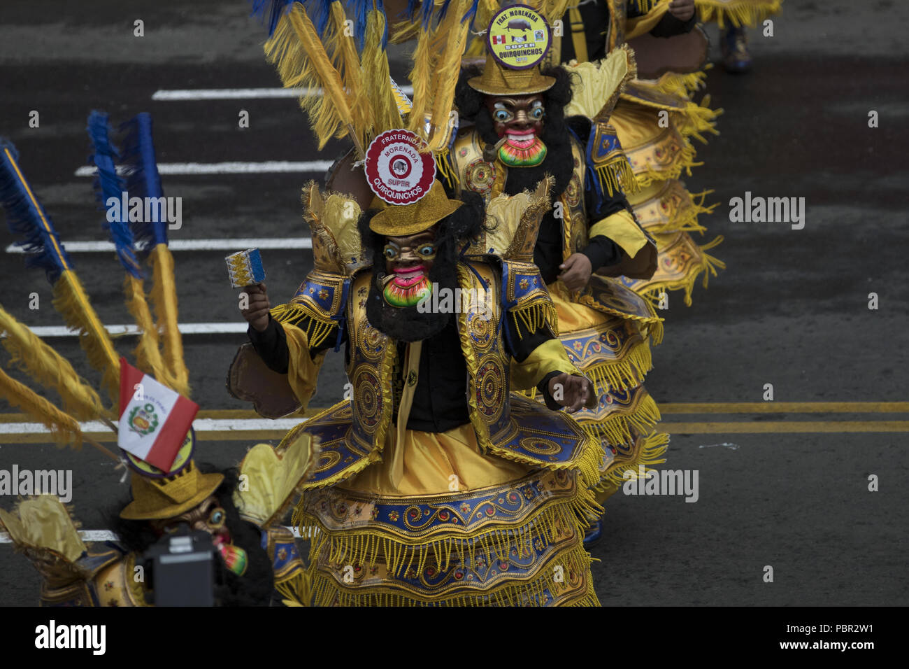 Lima, Lima, Peru. 29th July, 2018. Peruvian dancers seen performing at the military parade.Members of Peru's armed forces, coastguard, search & rescue, and police march in full uniform during the country's Gran Parada Militar. This parade always occurs the day after Peru's Independence Day marking the official end of festivities across the nation. Credit: Guillermo Gutierrez/SOPA Images/ZUMA Wire/Alamy Live News Stock Photo