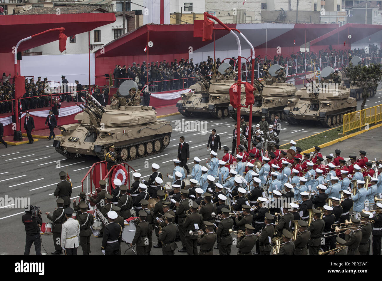 Lima, Lima, Peru. 29th July, 2018. Peruvian officers seen participating in the military parade.Members of Peru's armed forces, coastguard, search & rescue, and police march in full uniform during the country's Gran Parada Militar. This parade always occurs the day after Peru's Independence Day marking the official end of festivities across the nation. Credit: Guillermo Gutierrez/SOPA Images/ZUMA Wire/Alamy Live News Stock Photo