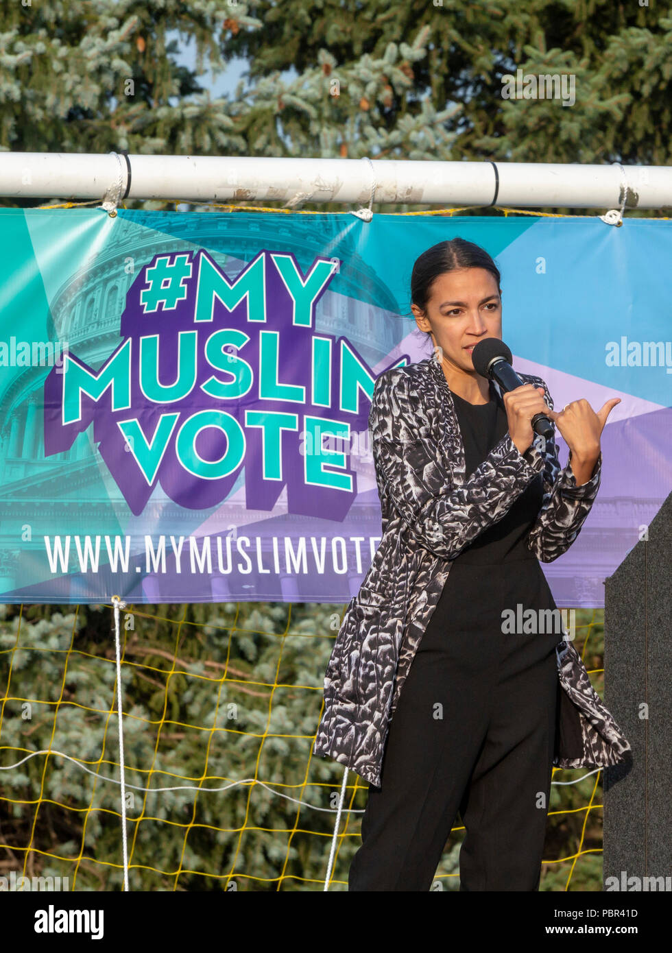 Dearborn, Michigan USA - 29 July 2018 - Alexandria Ocasio-Cortez speaks at a Muslim Get Out the Vote rally, sponsored by several Muslim community organizations. Ocasio-Cortez is the Democratic candidate for Congress in New York's 14th District, having upset incumbent Joe Crowley. Credit: Jim West/Alamy Live News Stock Photo