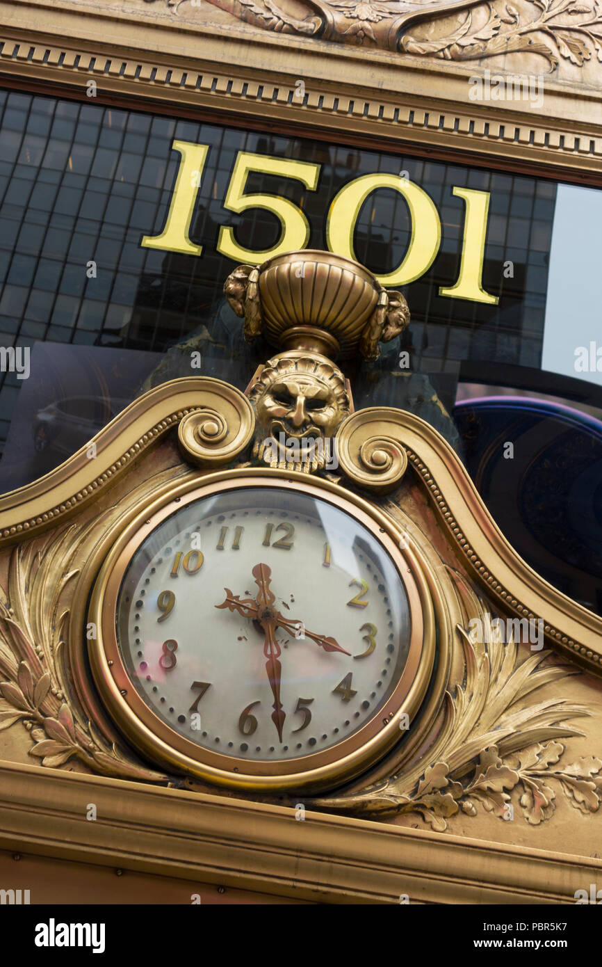 Clock above the entrance to the Paramount building, 1501 Broadway, Times Square, New York, USA Stock Photo