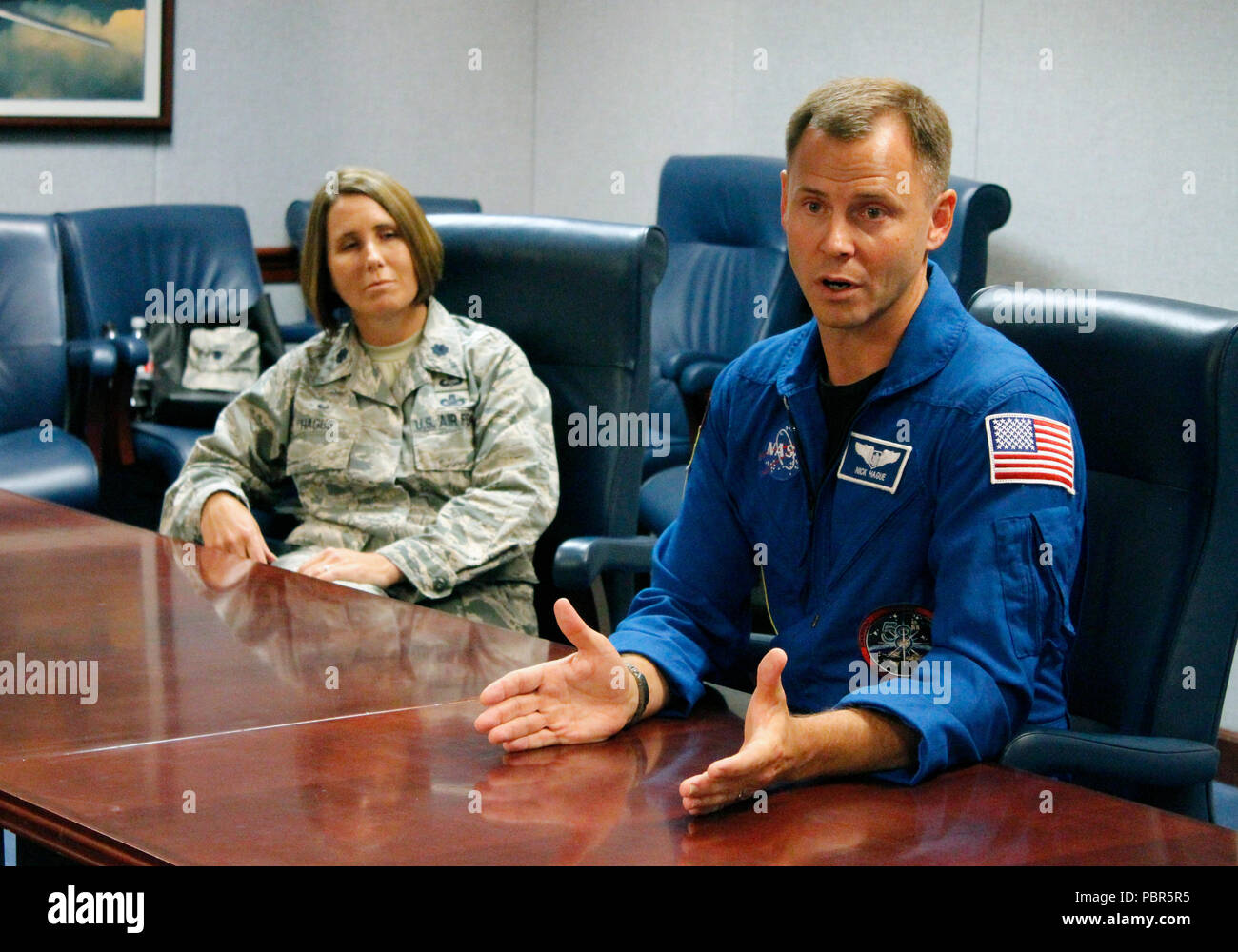 (From right to left) Col. Nick Hauge, an astronaut with NASA, and wife ...