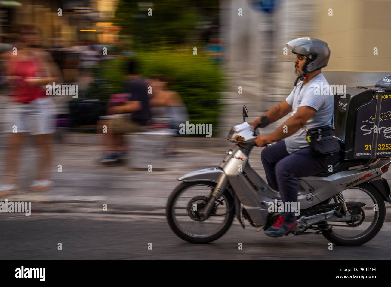 Delivery man helmet hires stock photography and images Alamy