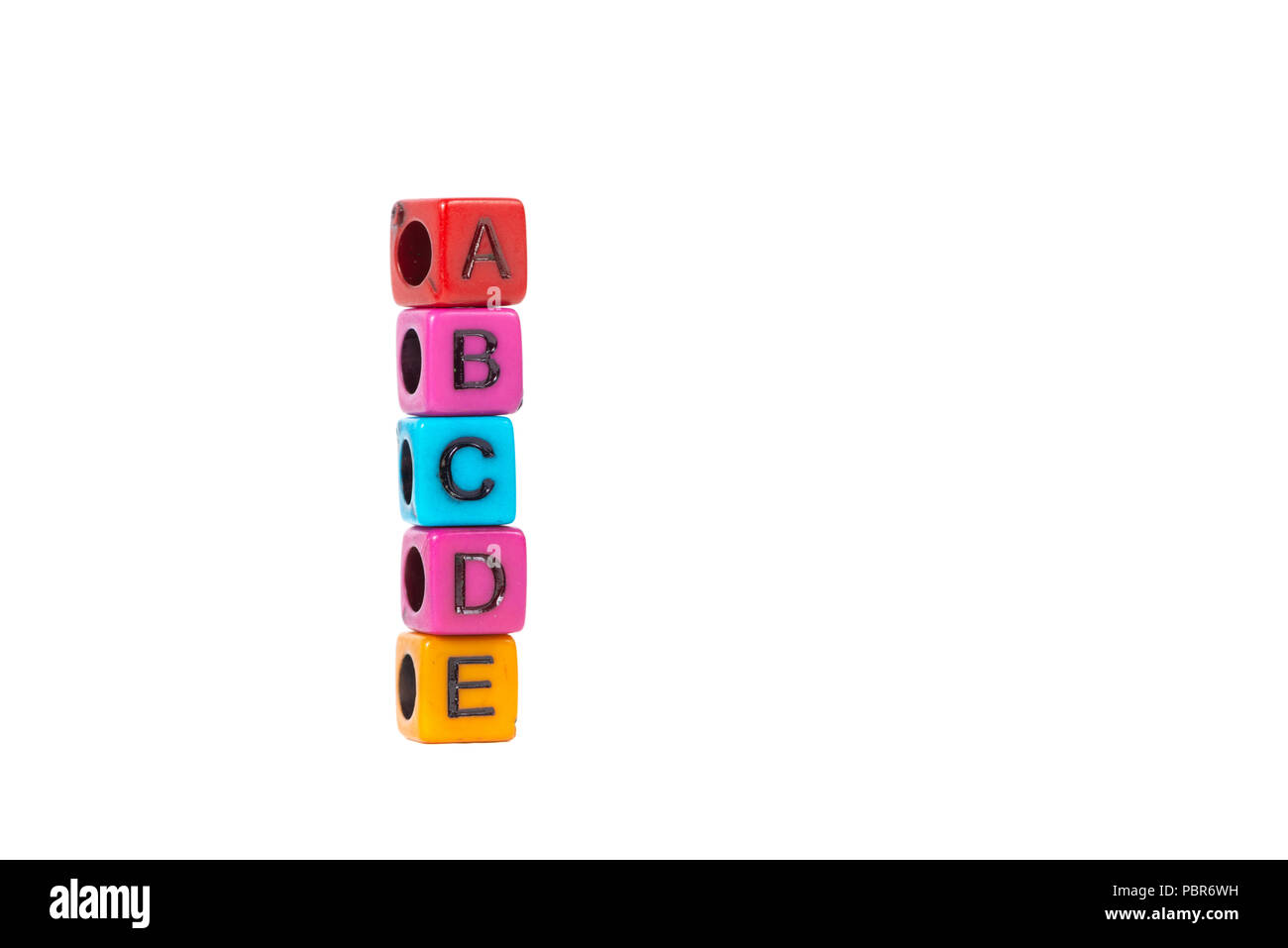 Pile of beads or letter bead with alphabet ABCDE on white background Stock  Photo - Alamy