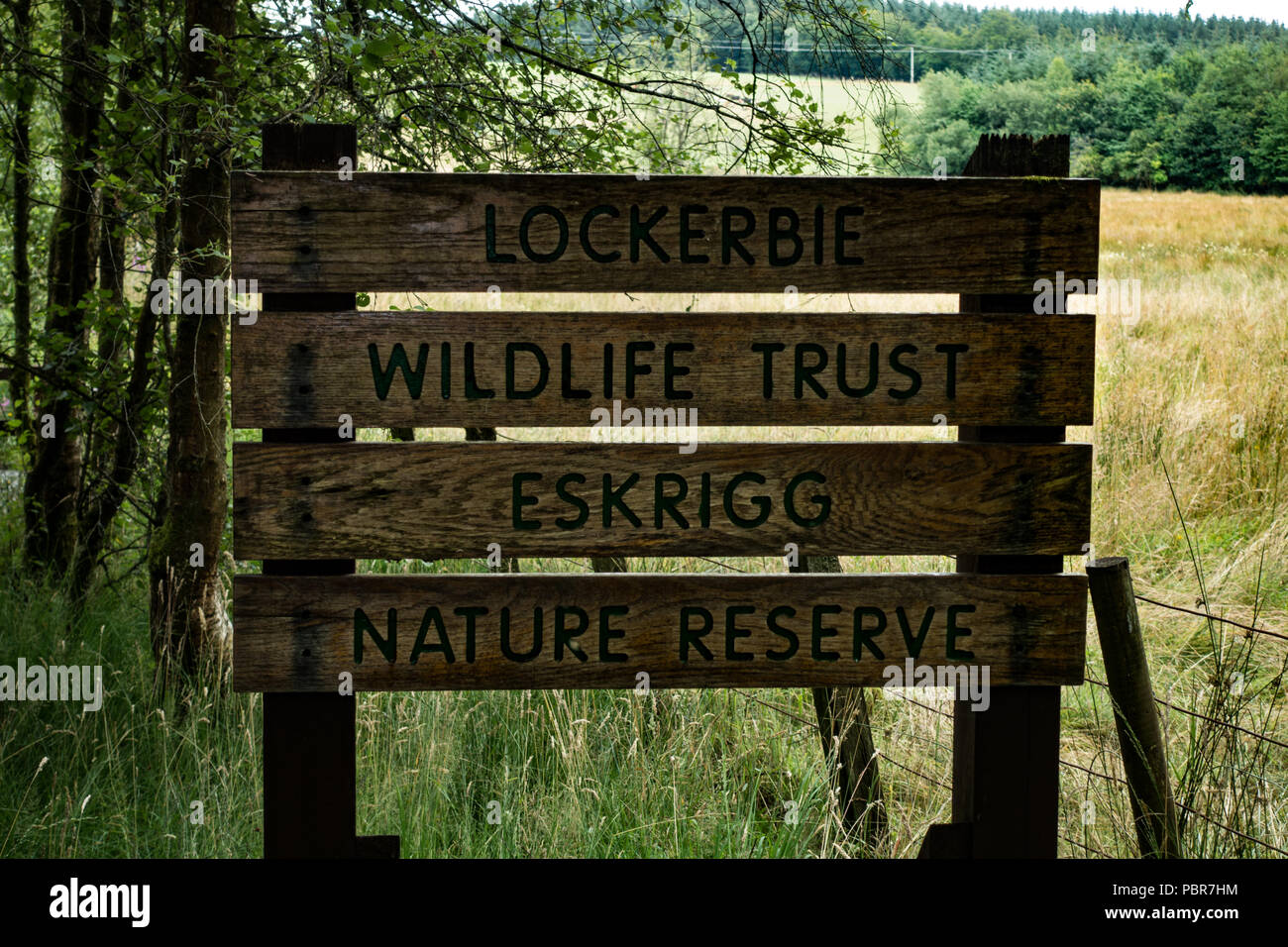 Sign board for Lockerbie Wildlife Trust. Eskrigg Nature Reserve.Scotland Stock Photo