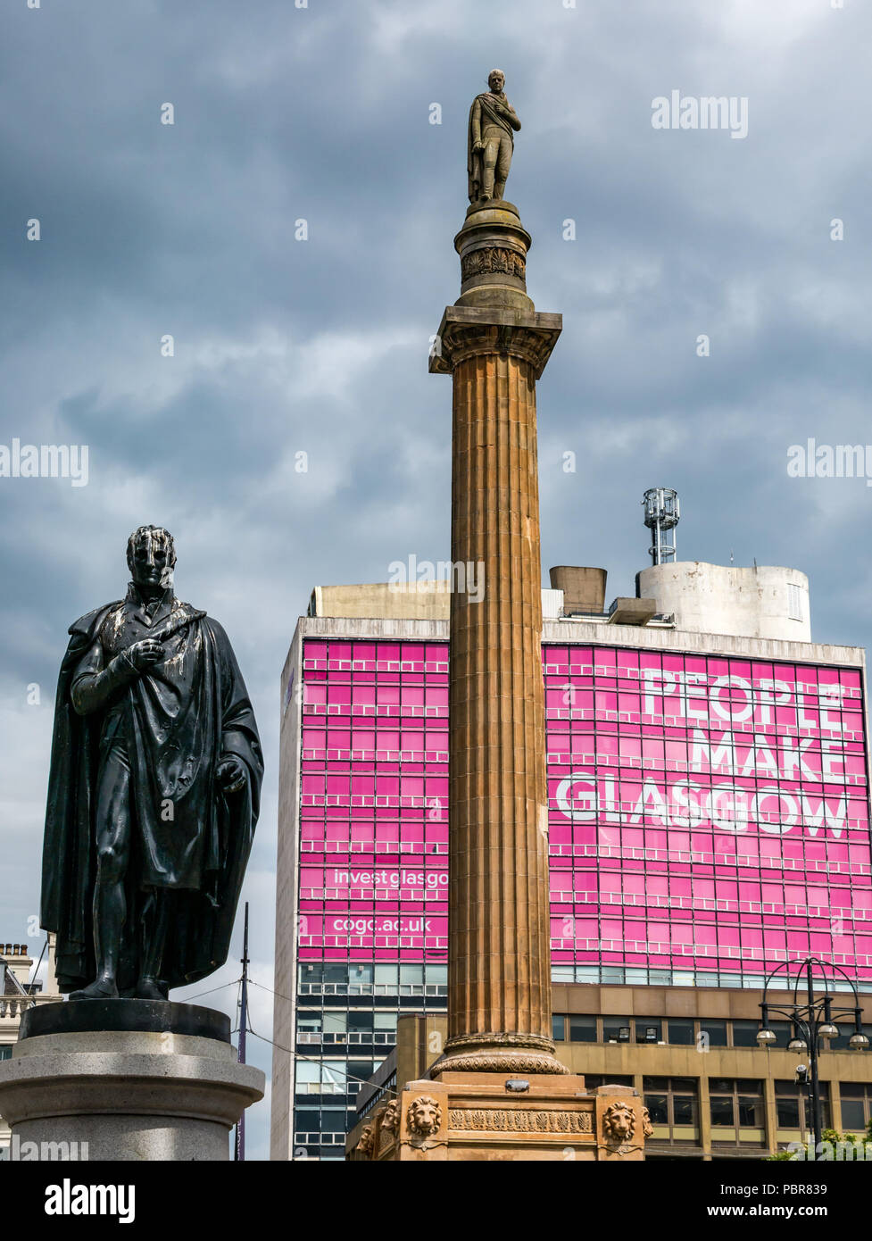 Sir John Moore statue, Sir Walter Scott memorial column and pink People Make Glasgow advert and stormy sky, George Square, Glasgow, Scotland, UK Stock Photo