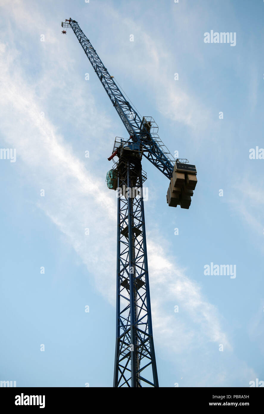 Crane with ballast on a construction site Stock Photo Alamy
