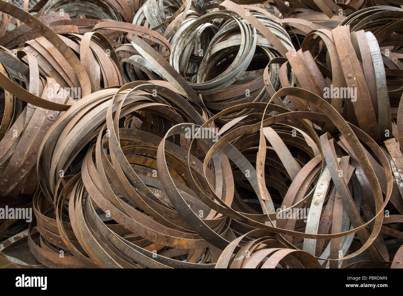 large pile of rusty Barrel hoops Stock Photo