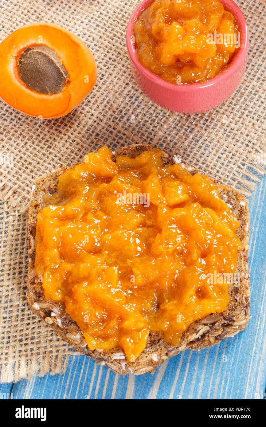 Fresh prepared sandwich with homemade apricot marmalade, concept of healthy sweet snack Stock Photo