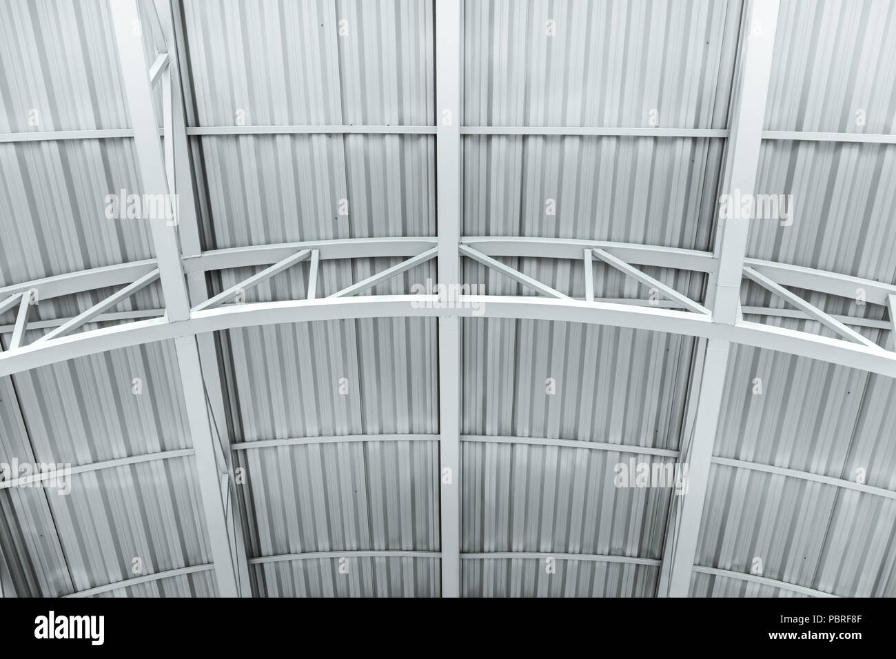 ceiling of the industrial building. metal structure of warehouse roof Stock Photo